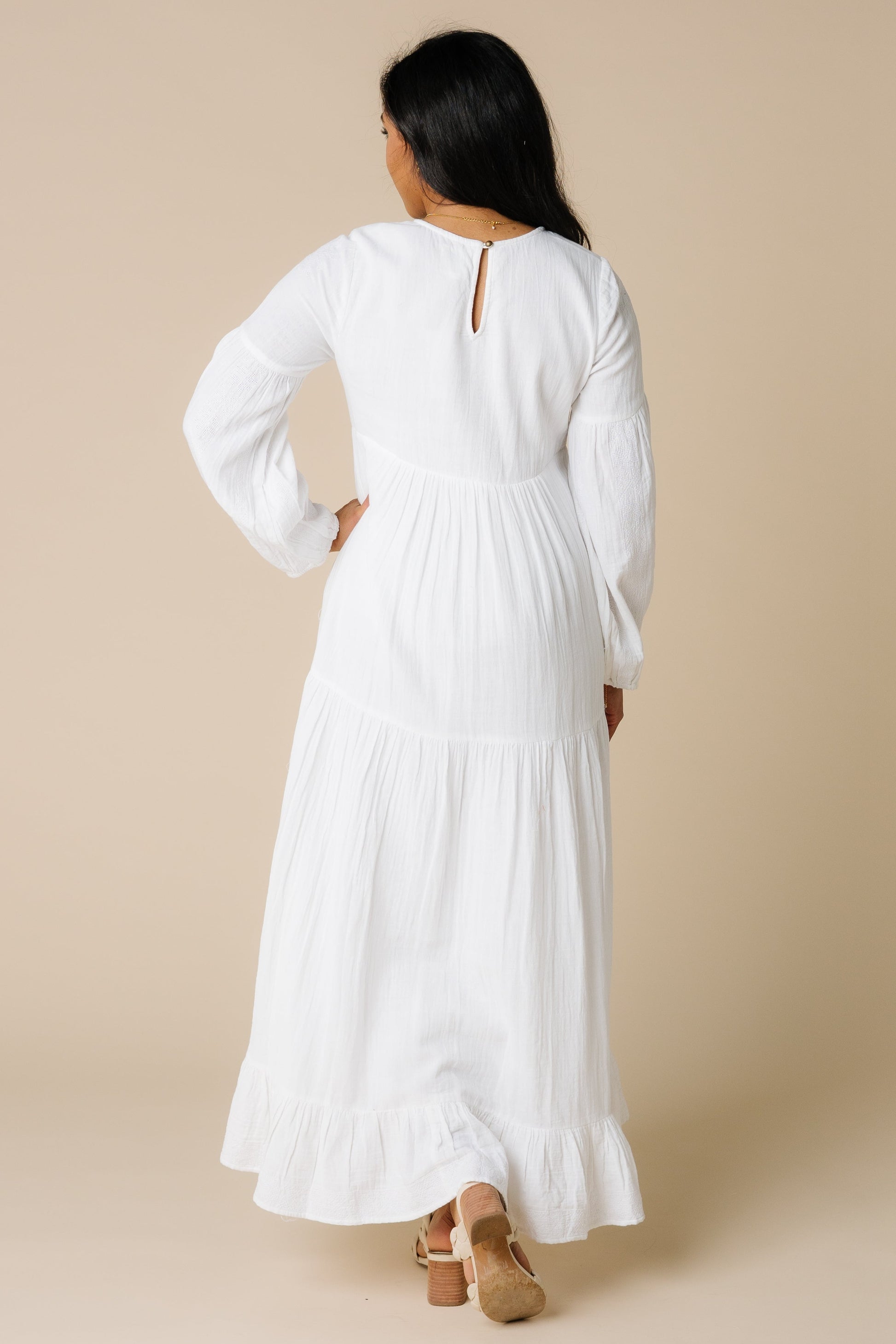 Back view of all white maxi dress