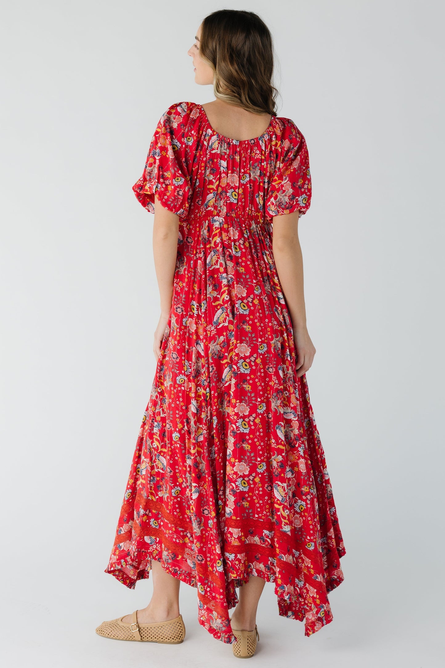 Back view of red print maxi with short sleeves