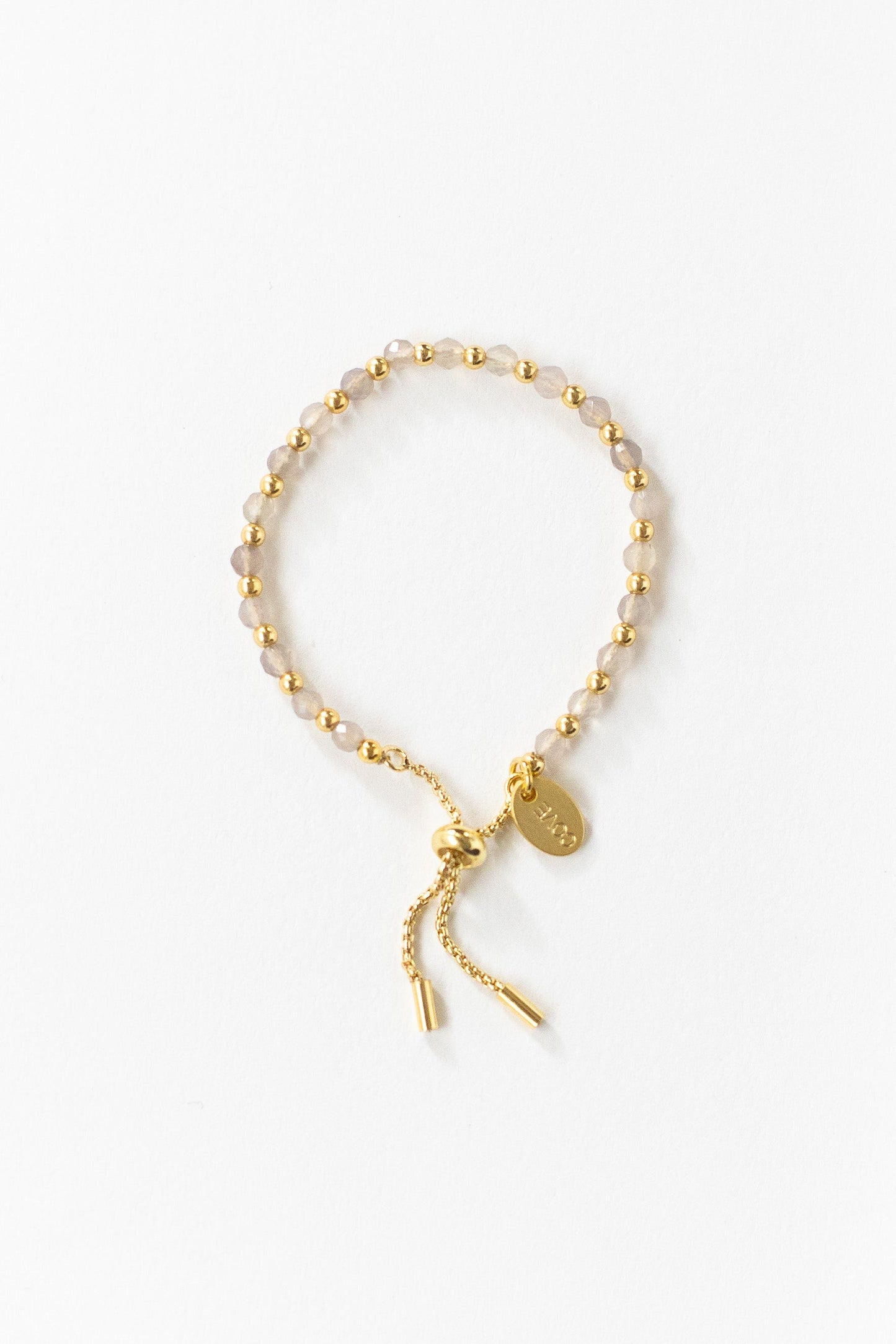 Baby bracelet in topaz and gold with matching mom and child sizes