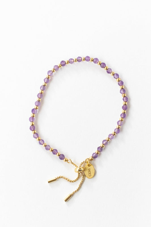 Baby bracelet  in purple and gold beads