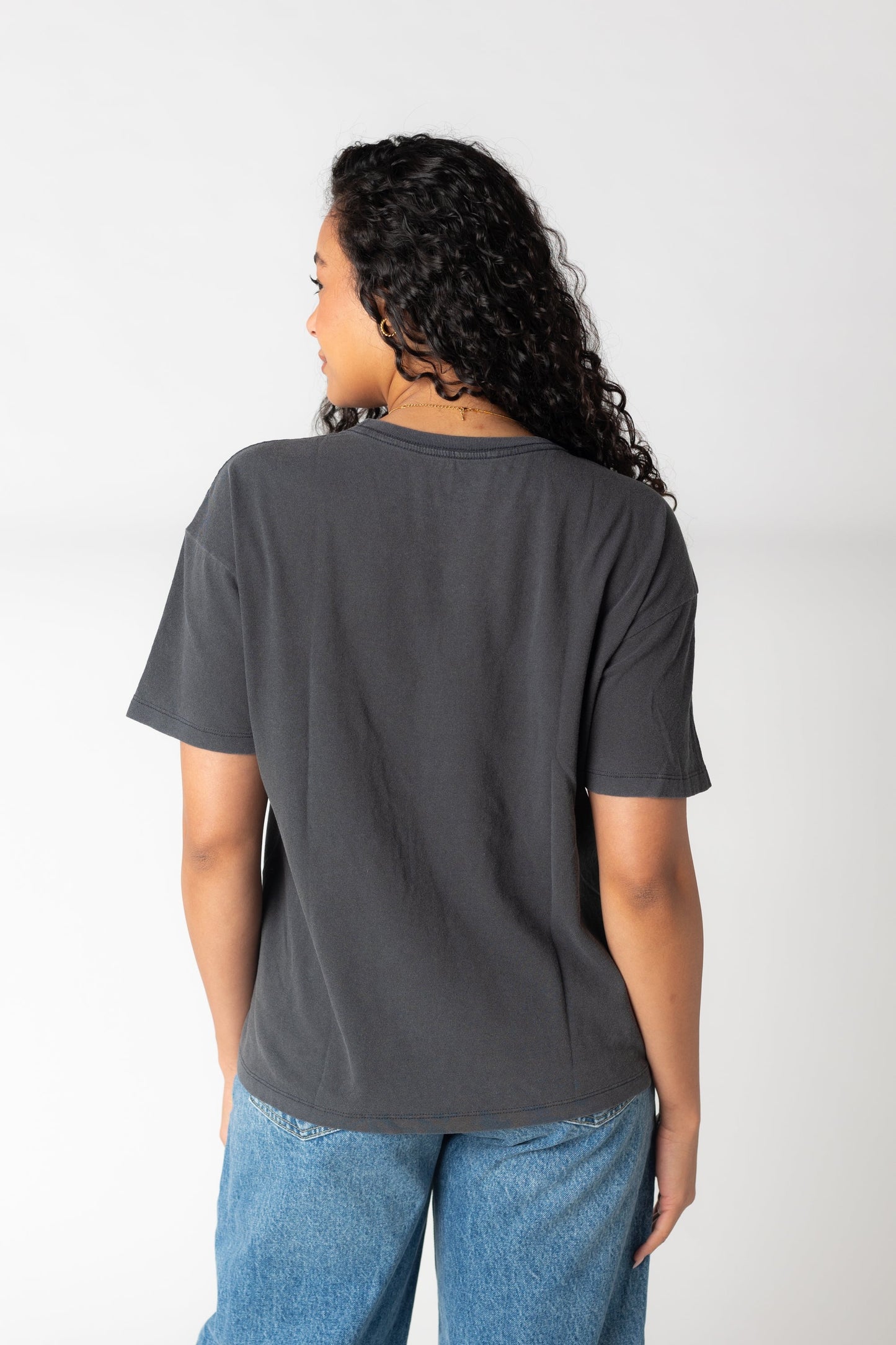 Back view of black short sleeve tee by Roxy ARJZT07908