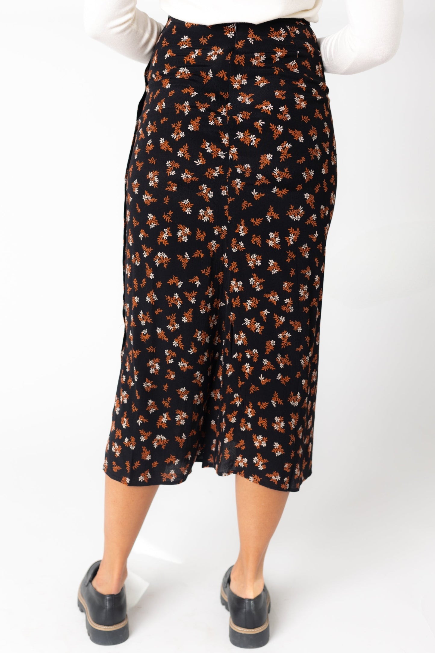 Erica back view of floral print A-line skirt