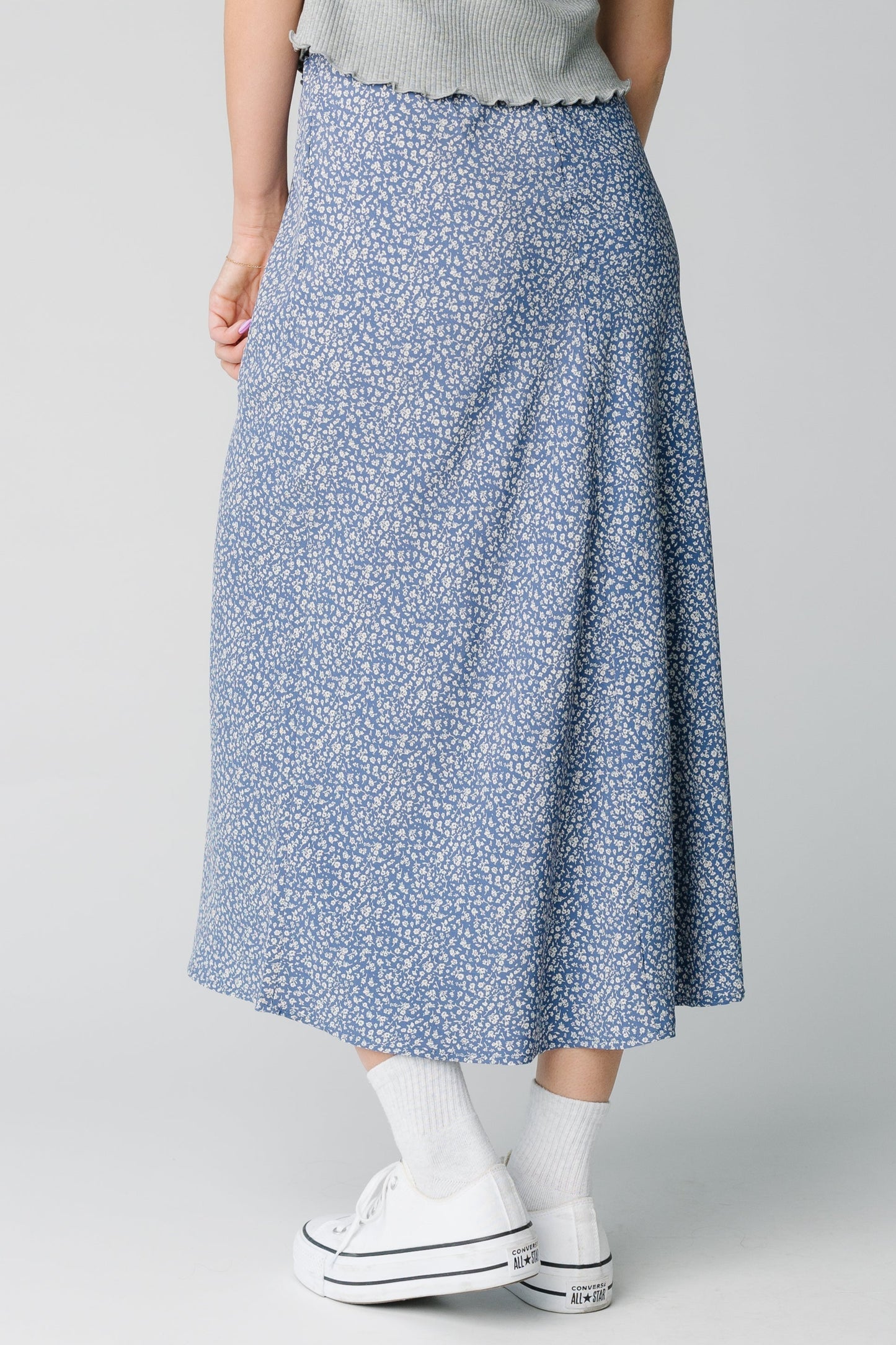 Back view of dusty blue floral midi skirt