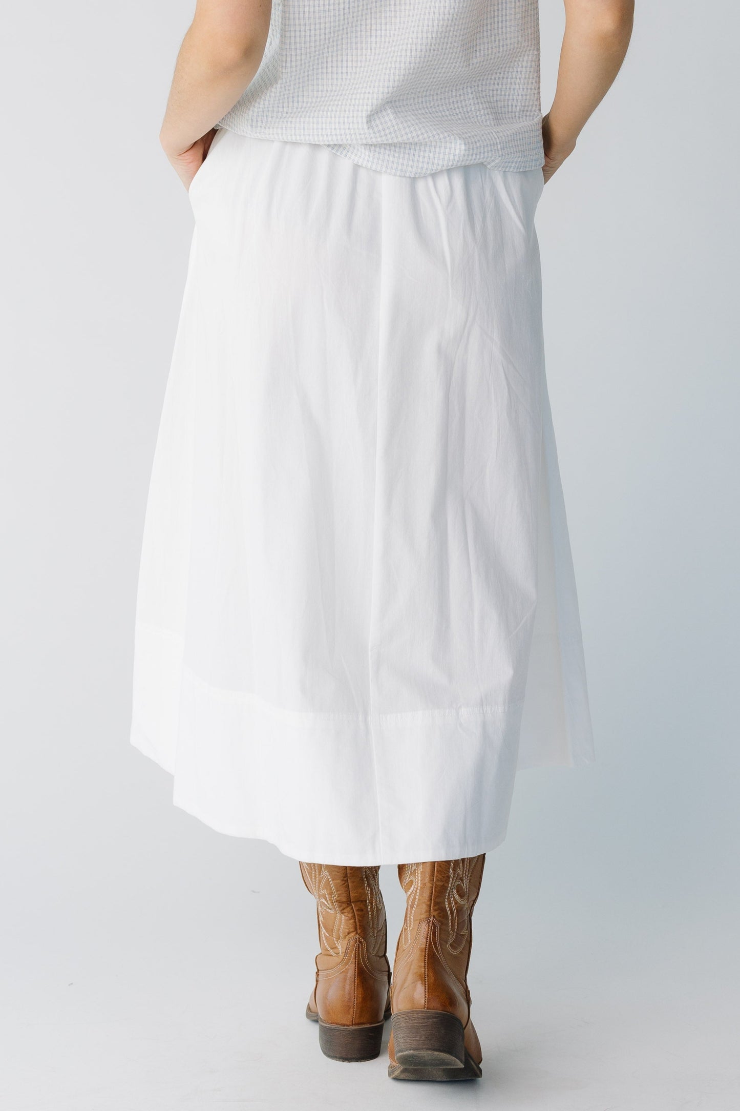 Back view of white woven midi skirt
