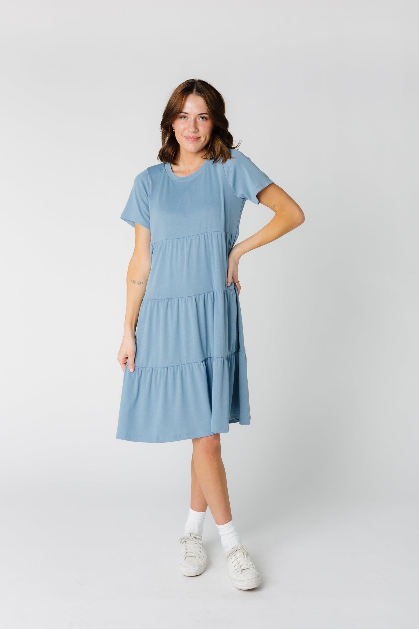 Modest women's tiered dress with short sleeves in dusty blue