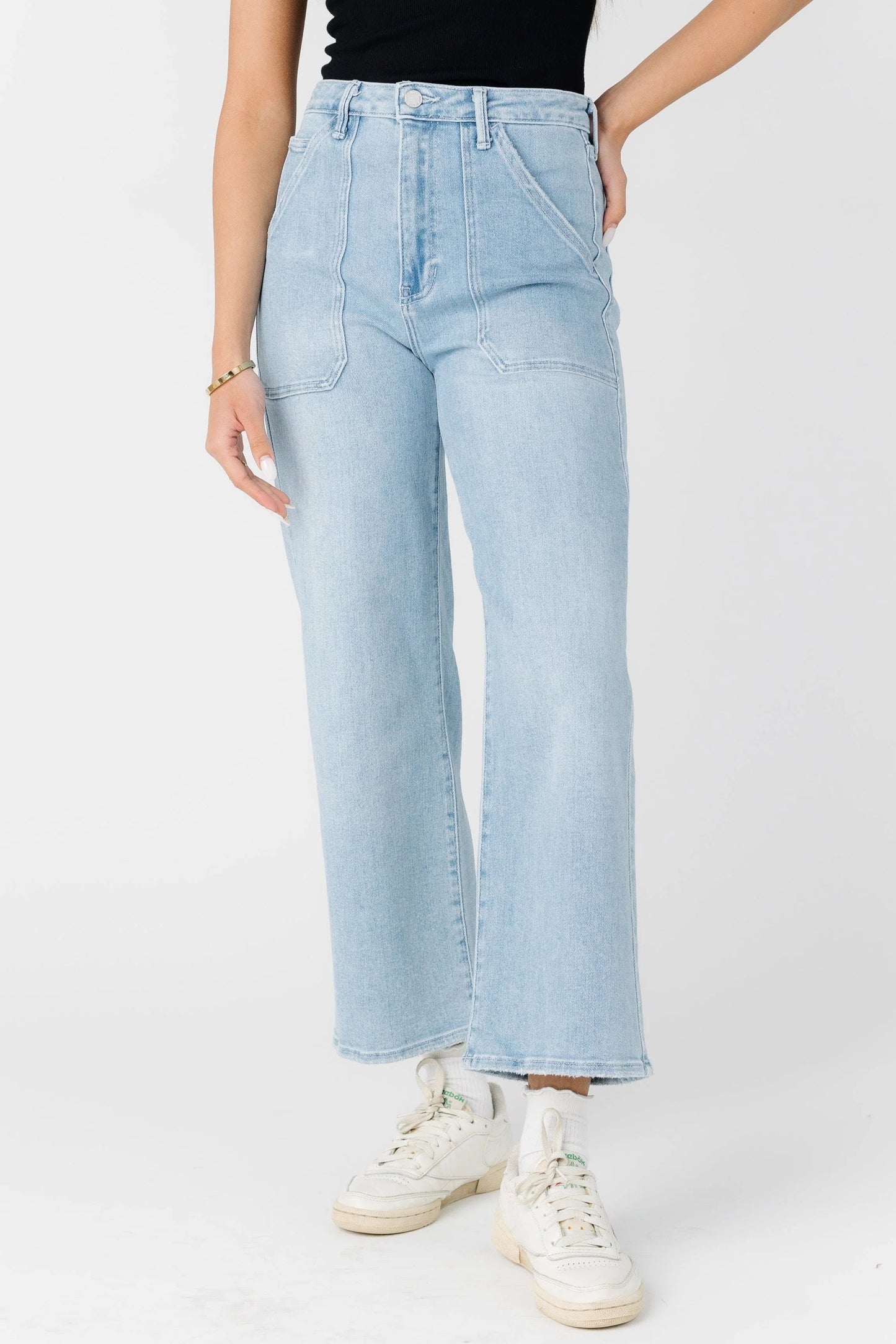 Modest light denim jeans with cropped leng leg