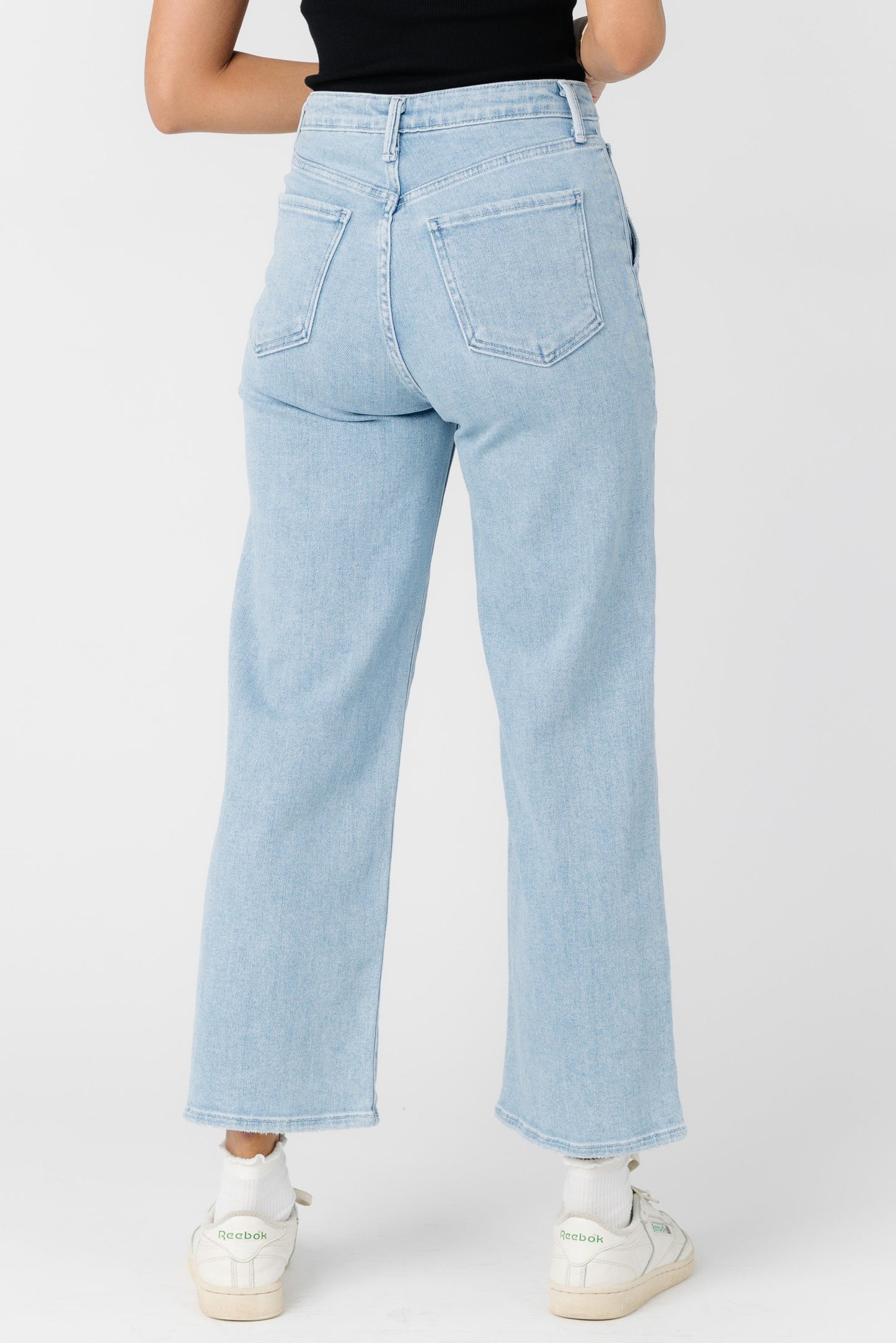 Back view of light denim jeans with high rise waist