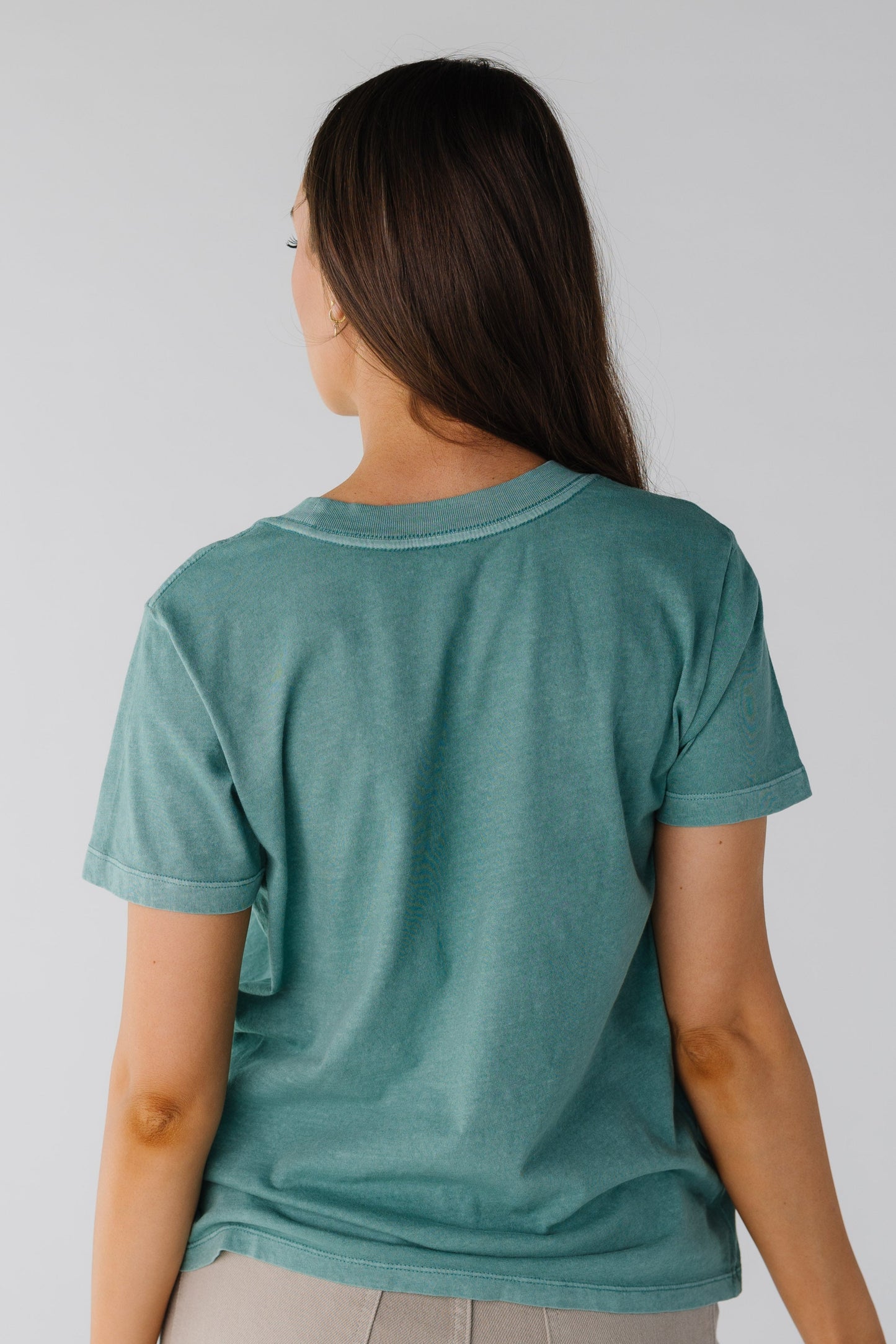 Back view of blue green short sleeve tee