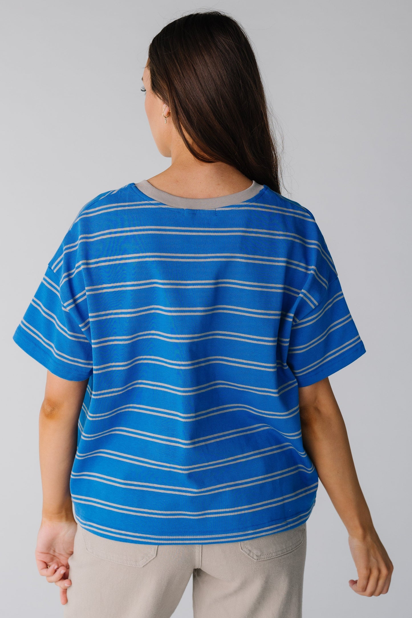Back view of royal stripe boxy tee