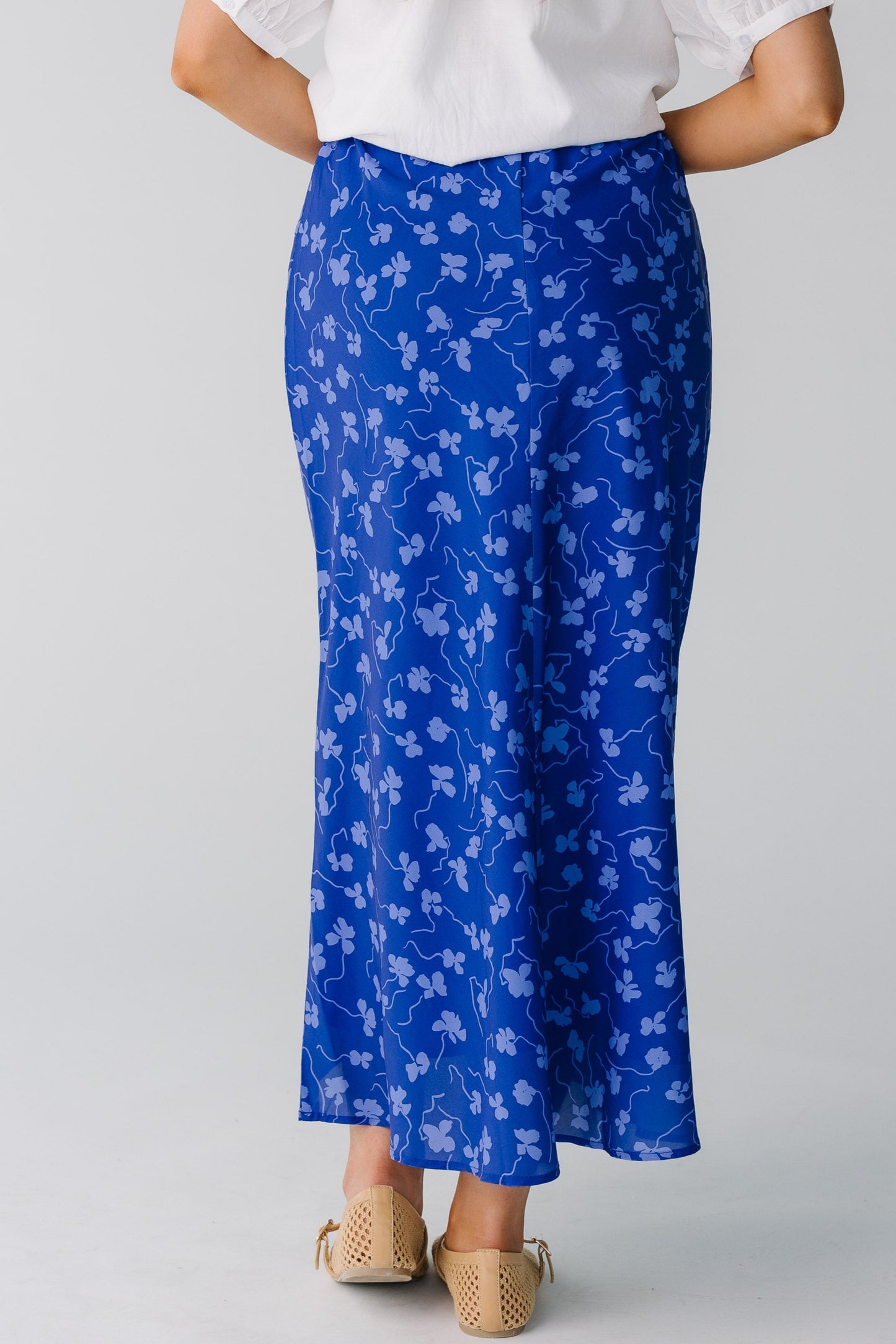 Back view of blue floral midi skirt