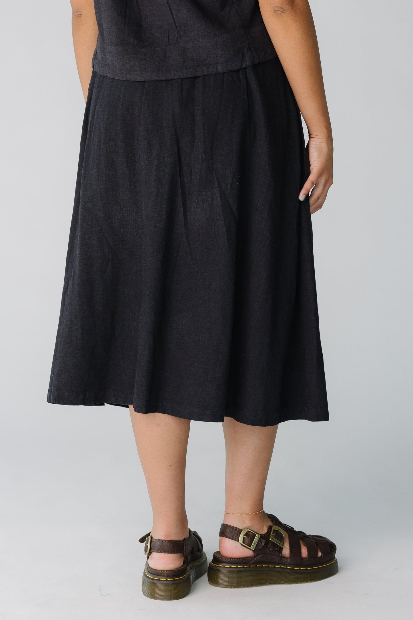 Back view of black midi skirt