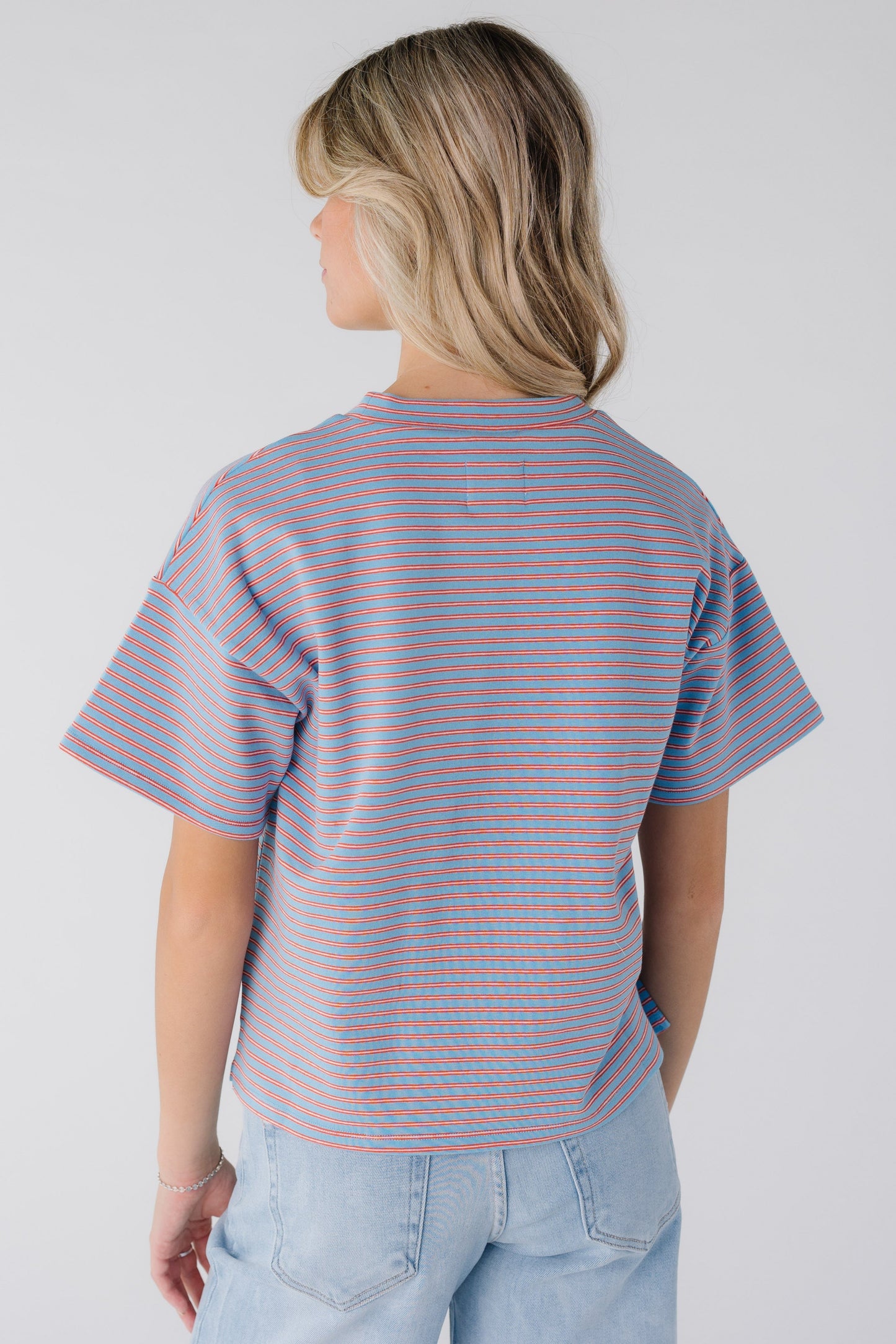 Back view of light blue stripe boxy tee