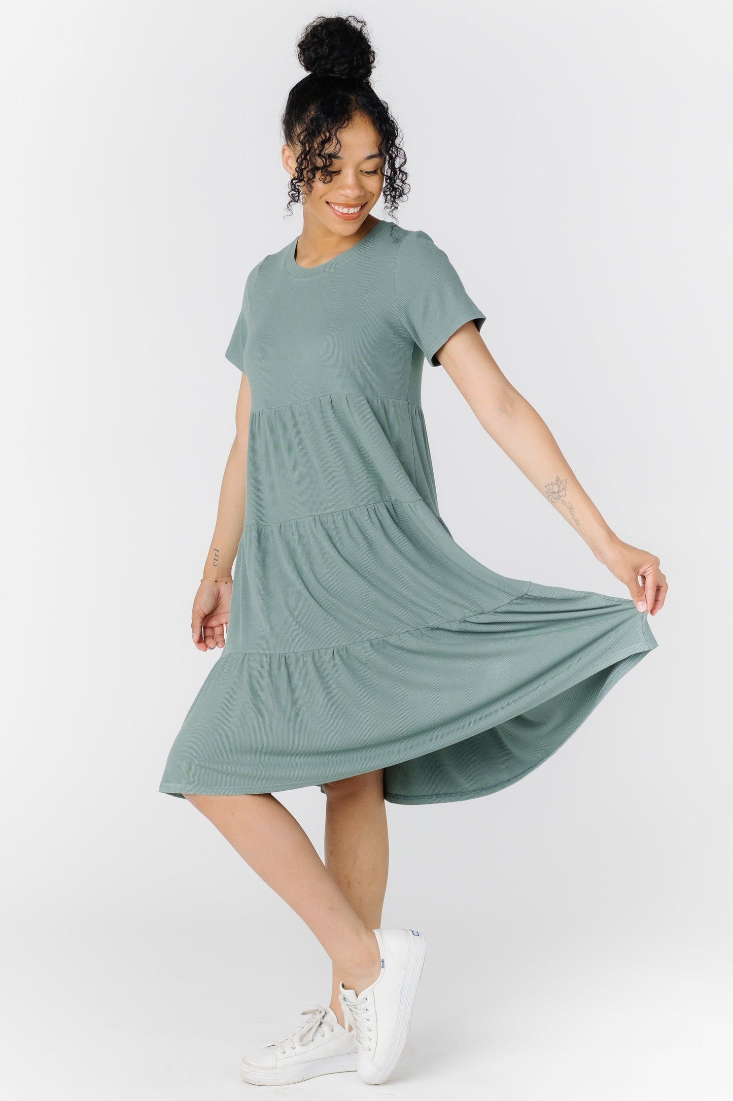Modest women's knit dress with round neckline and short sleeves in seafoam green