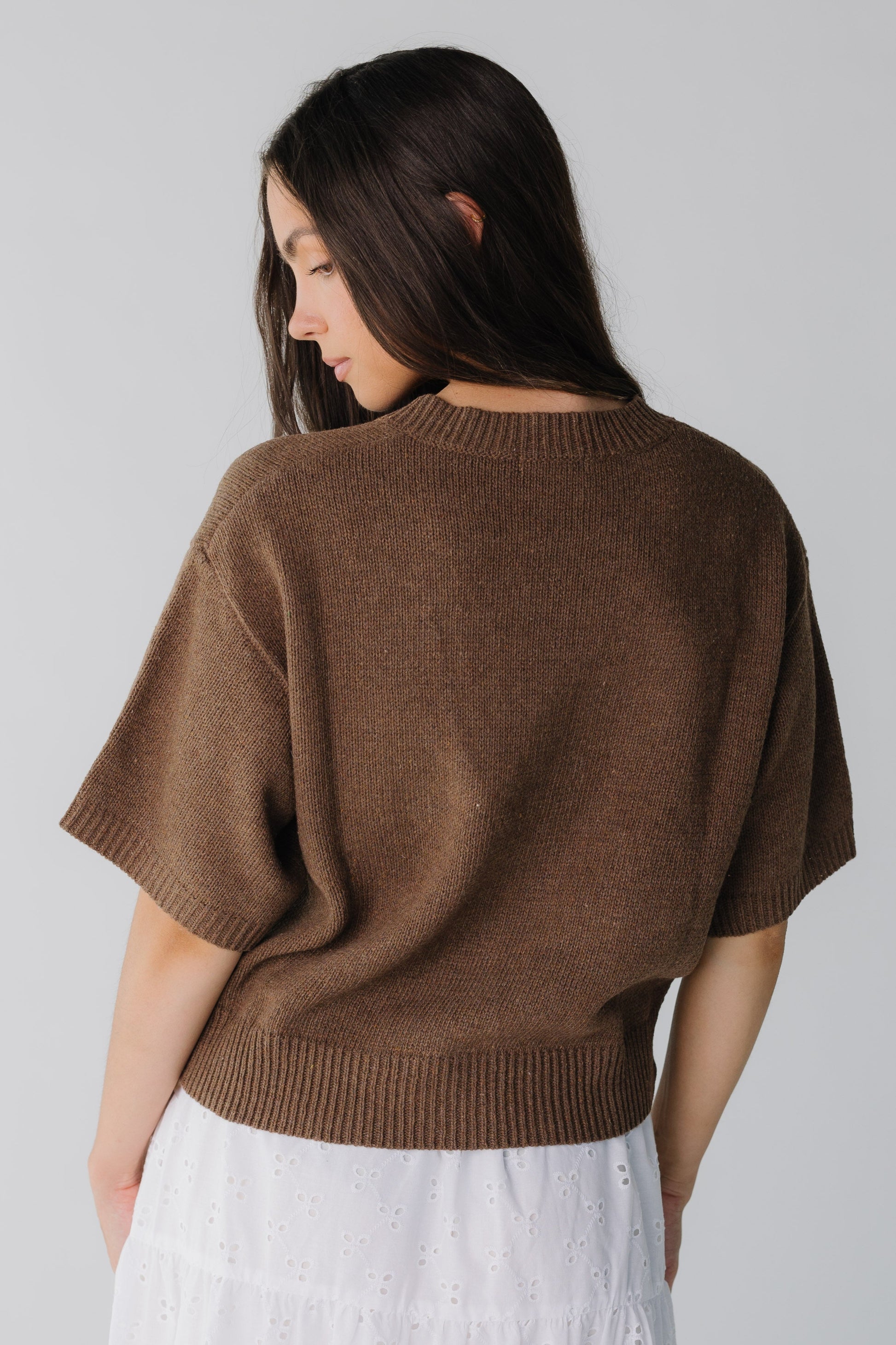 Back view of wide ribbed waist and half length sleeves
