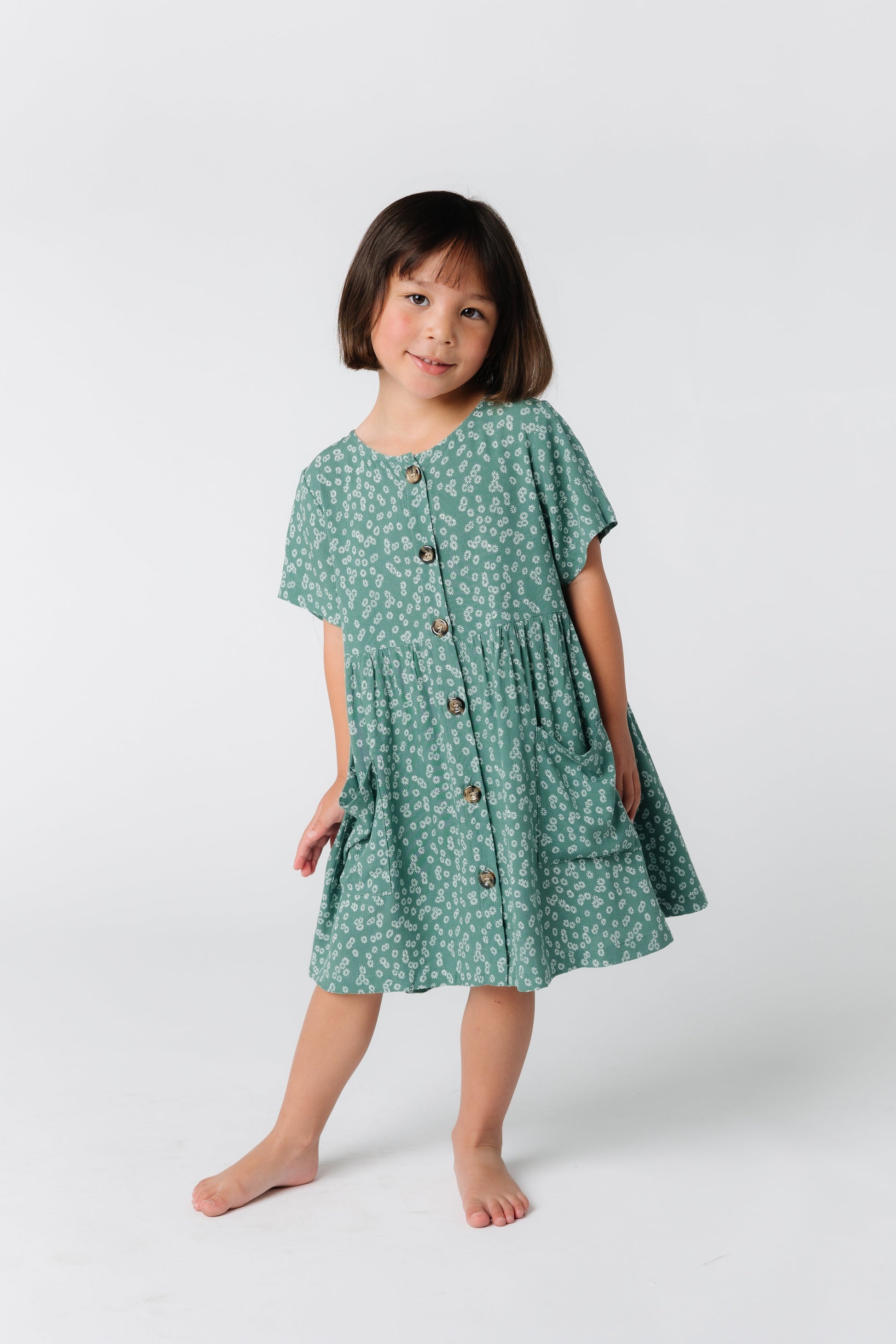 Sweet button down dress for little girl's with large front pockets