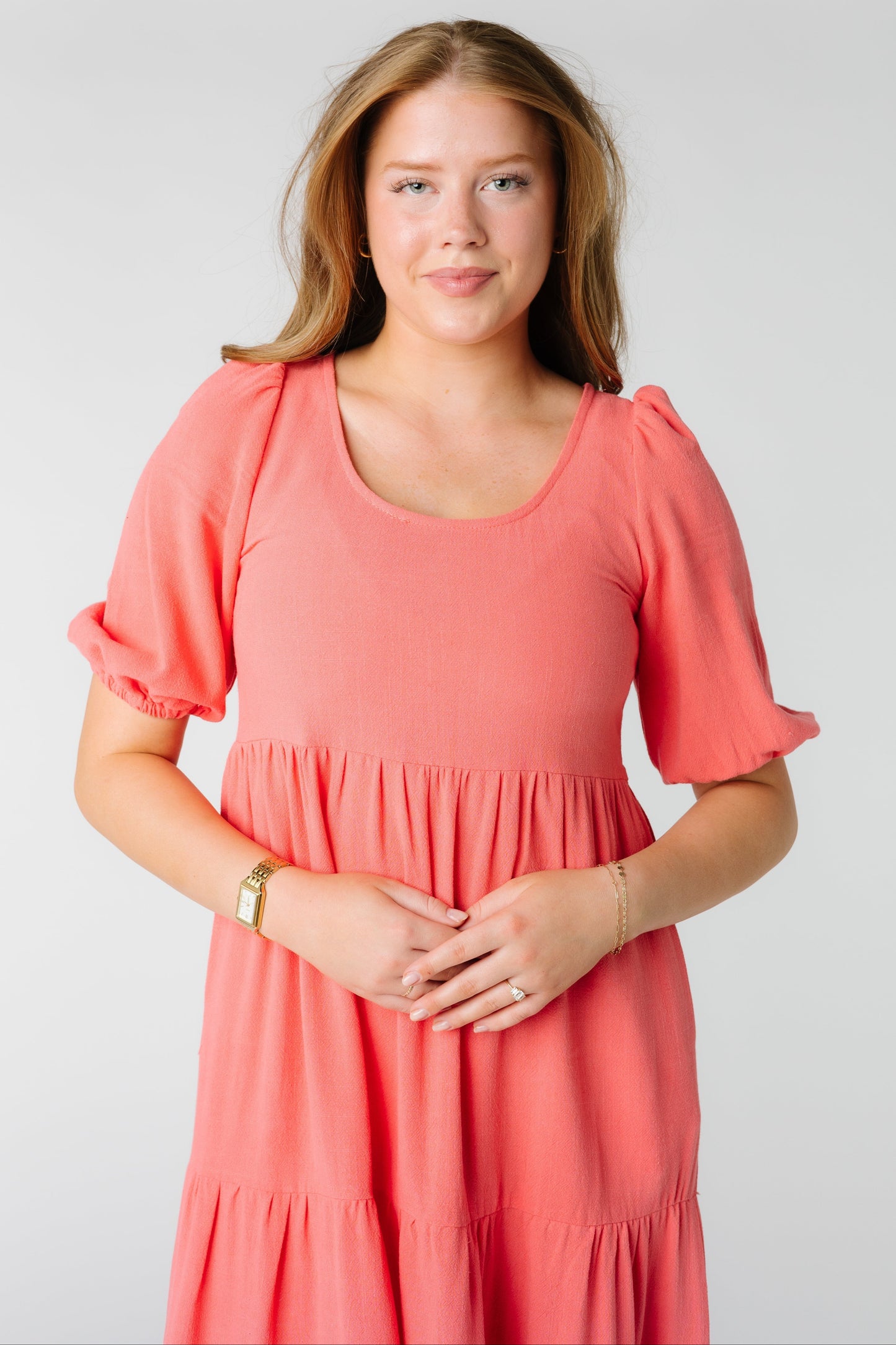 Scoop neckline dress with elbow length puff sleeves