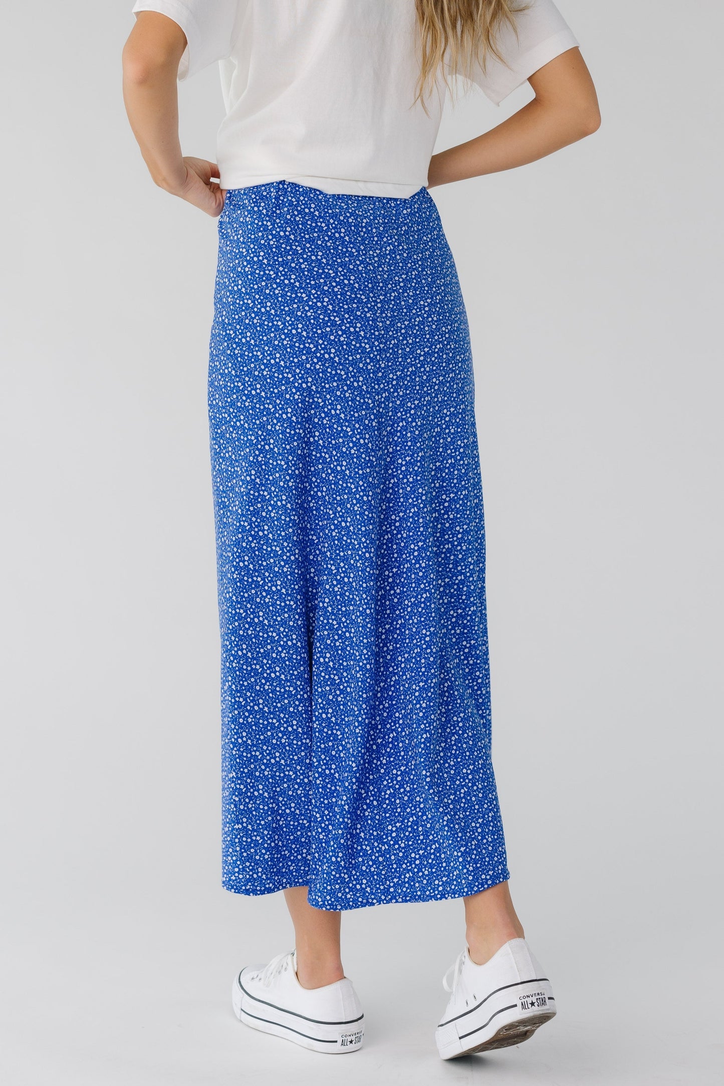 Back view of blue and white floral midi skirt