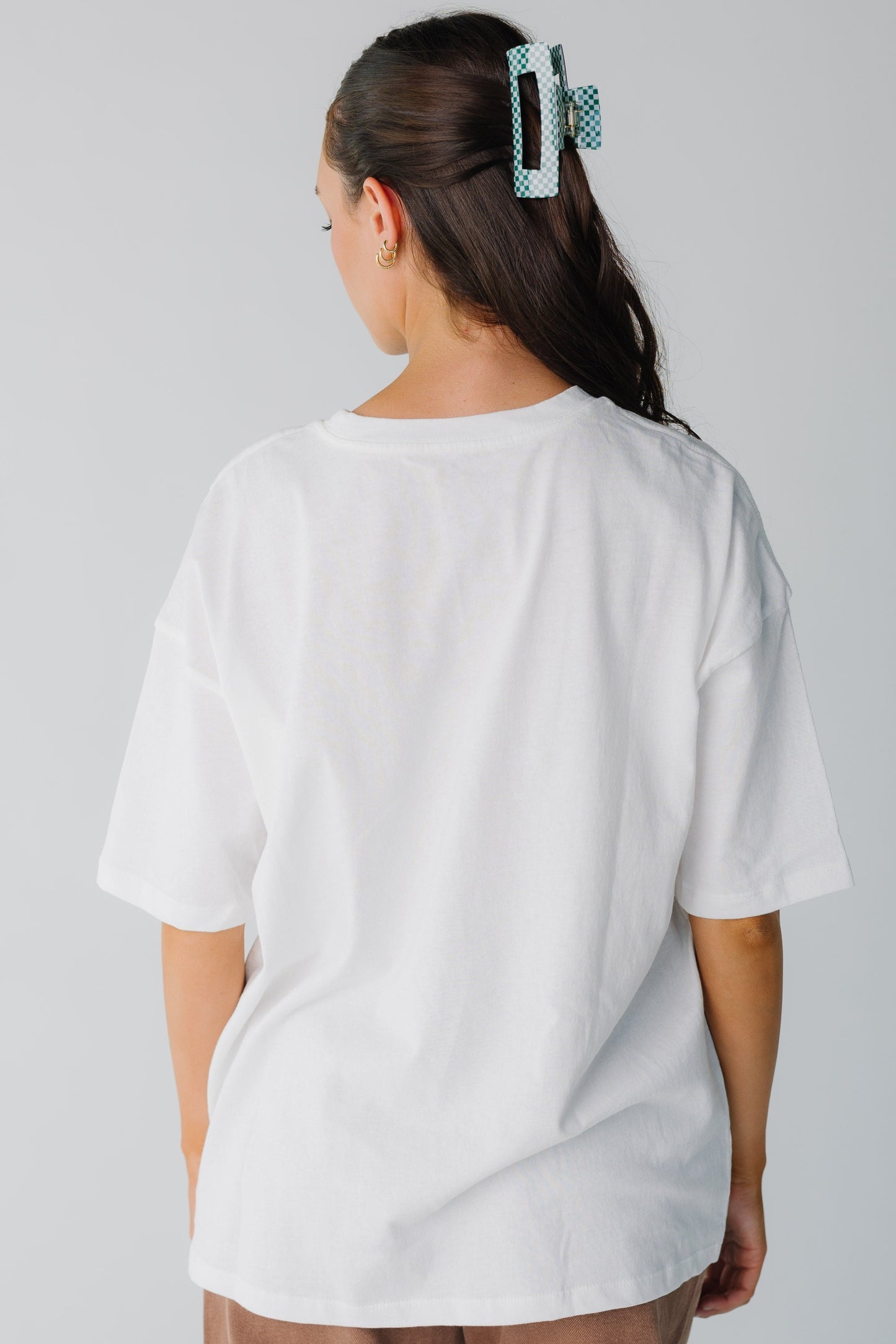 Back view of Billabong white with short sleeves