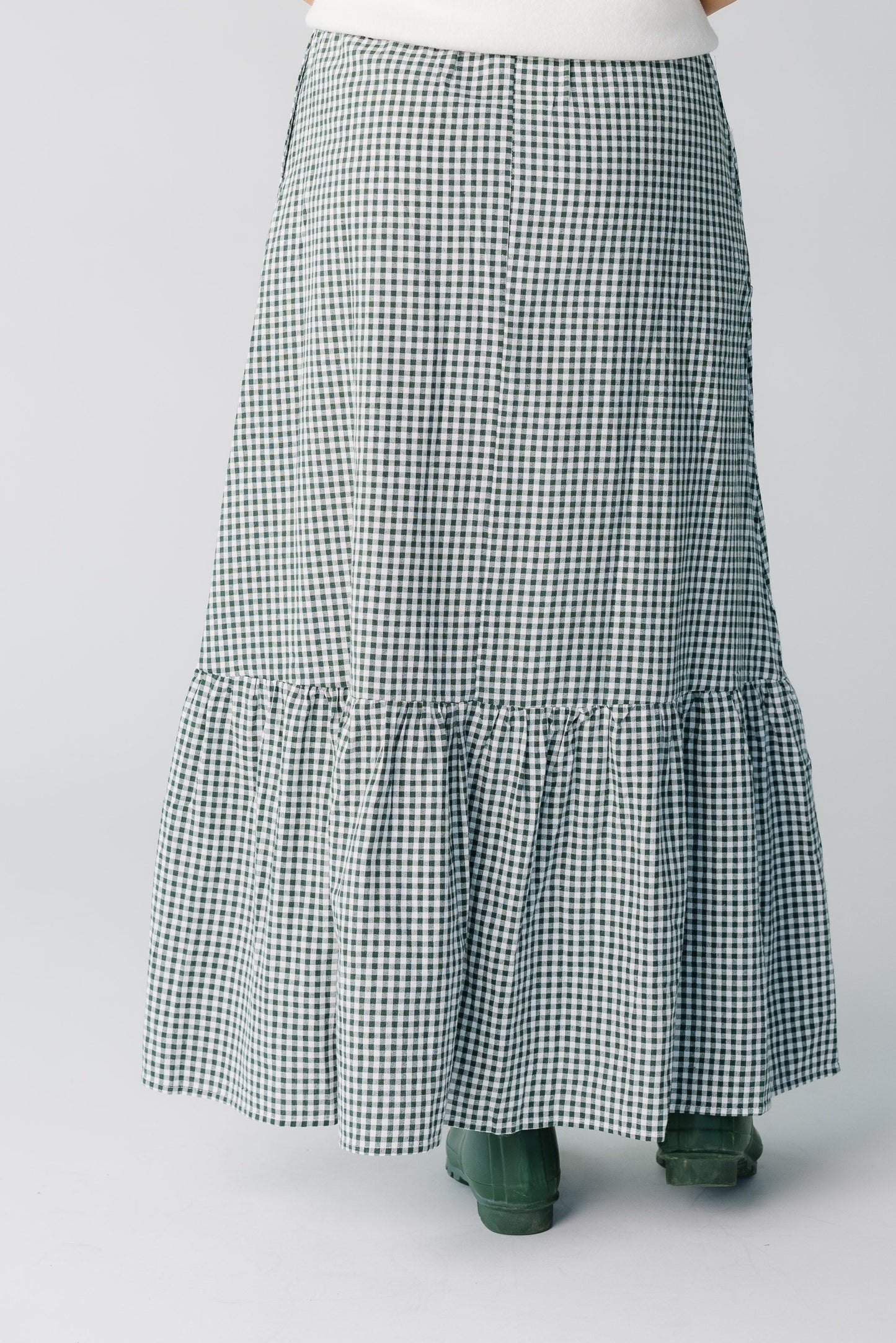 Back view of green gingham maxi skirt
