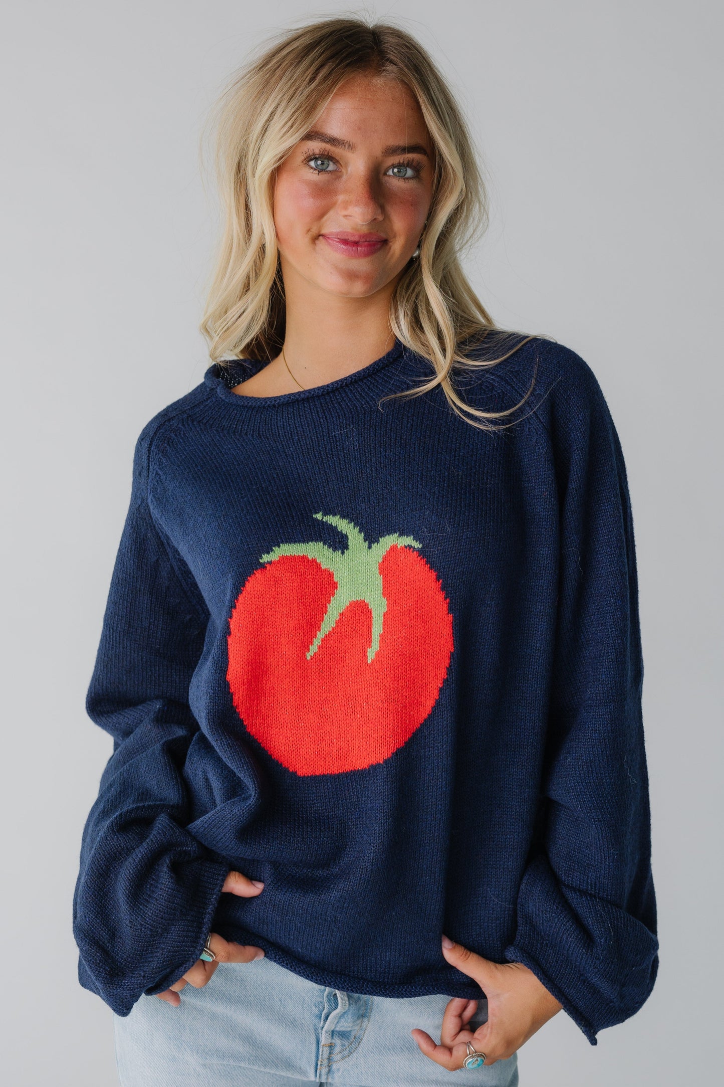 Modest women's oversized graphic sweater in navy with a large tomato graphic