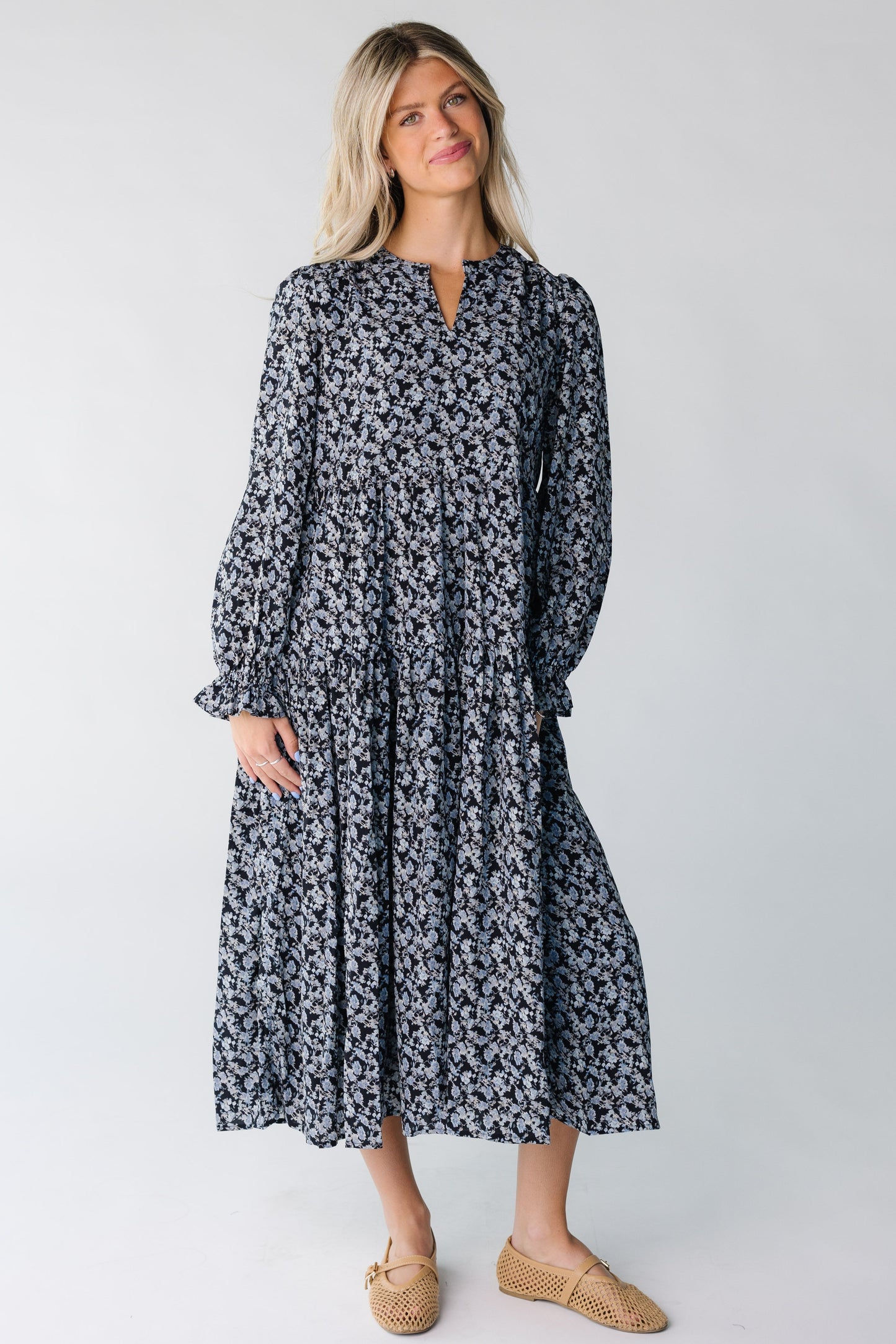 Modest women's black and blue floral midi dress with long sleeves