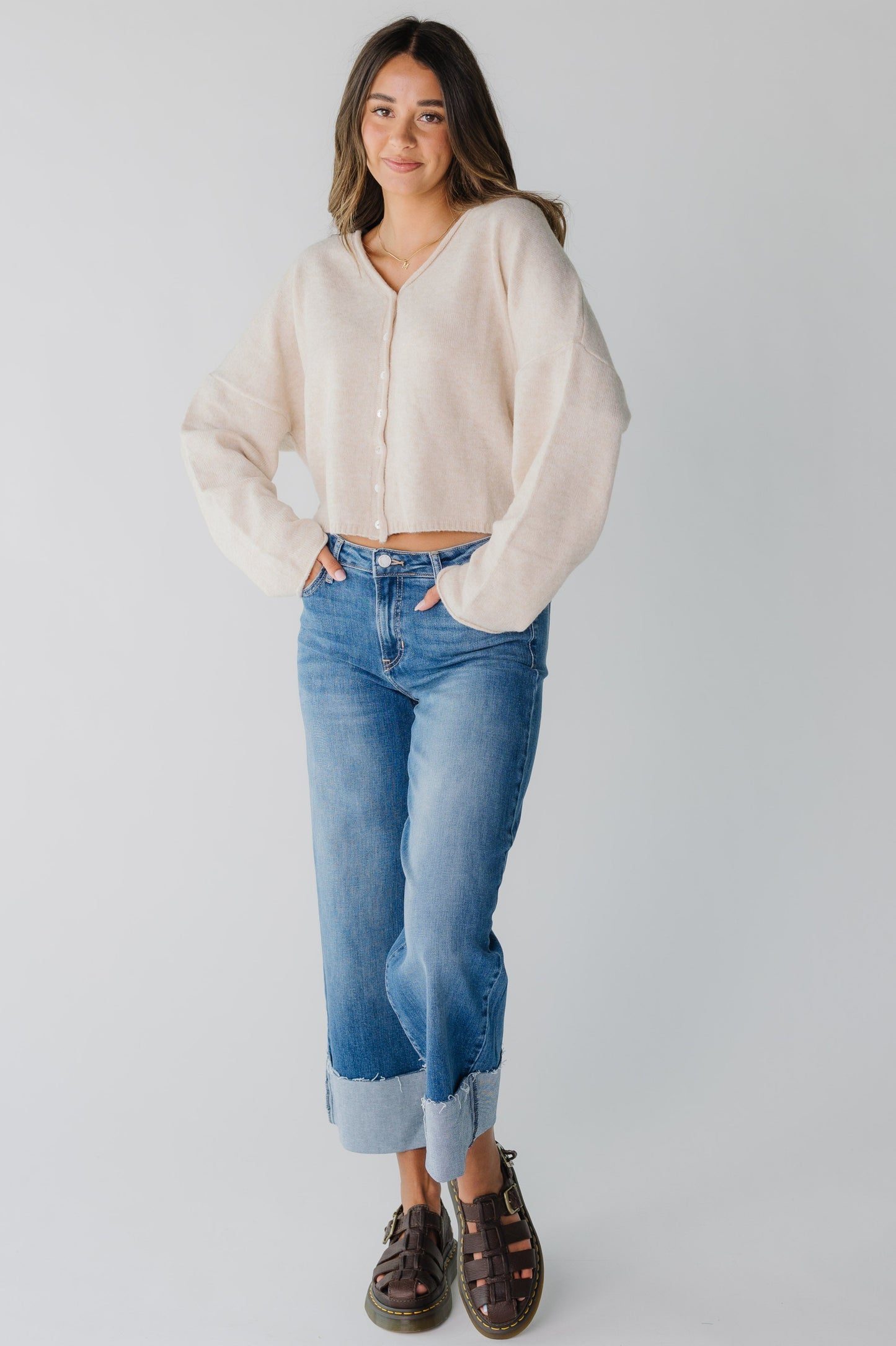 Modest women's oatmeal color cardigan with V-neckline and long sleeves