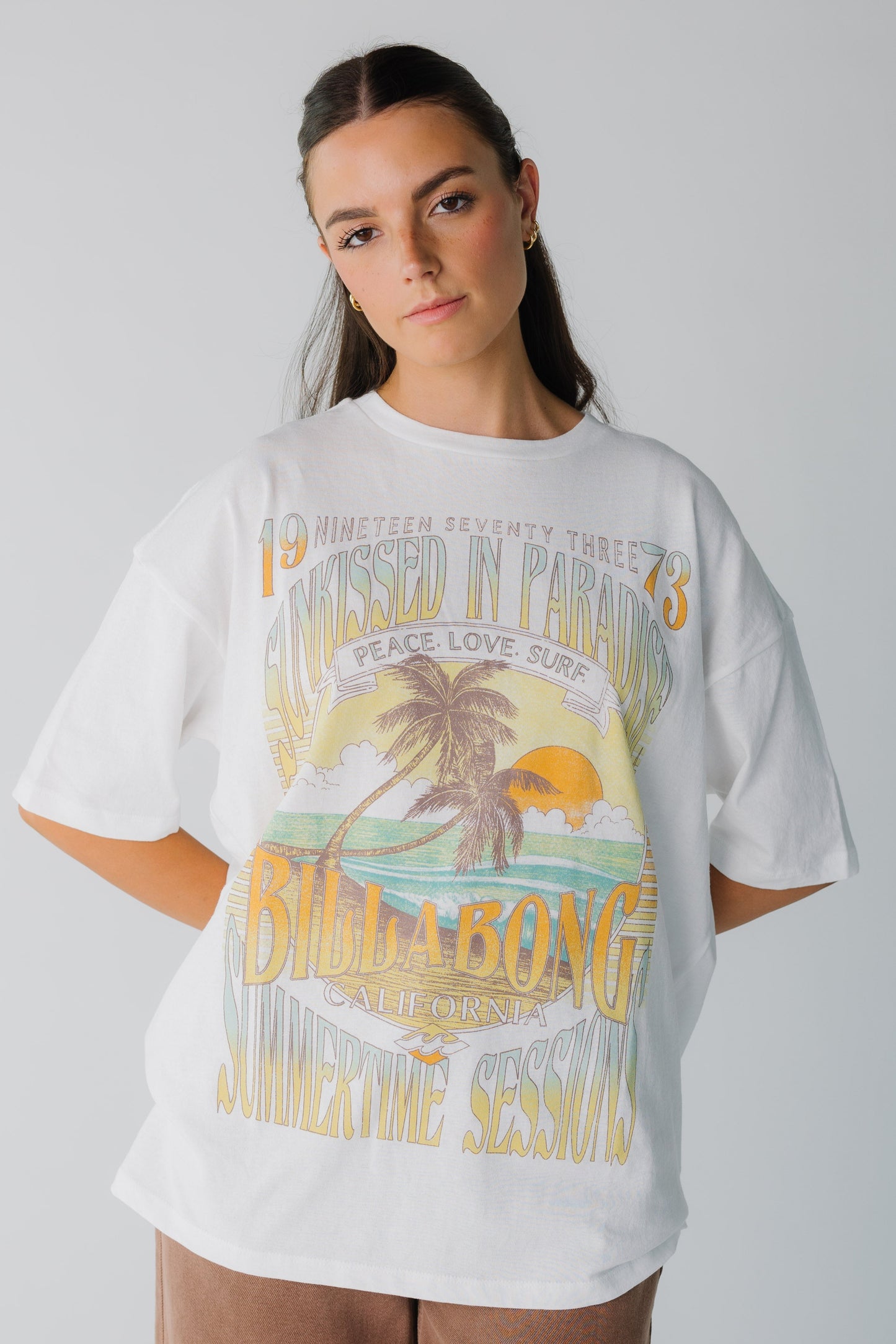 Modest loose fitting graphic tee with short sleeves and crew neckline in white