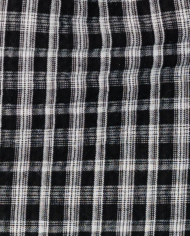 Fabric swatch in black and white plaid