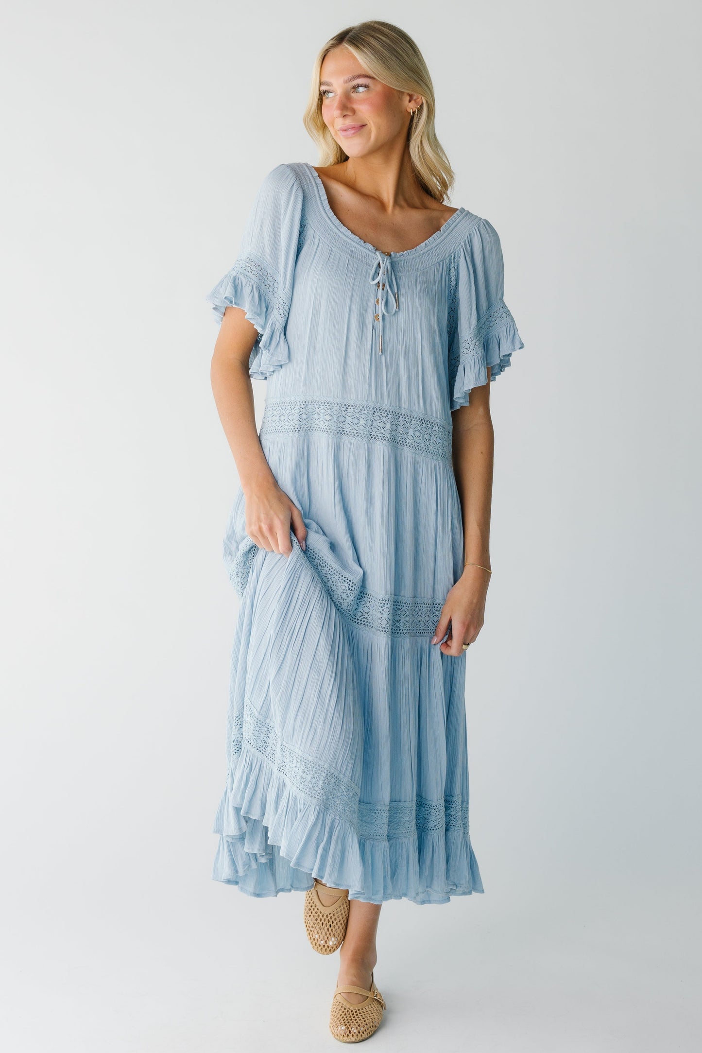 Light blue modest midi with short flutter sleeves and scoop neckline.