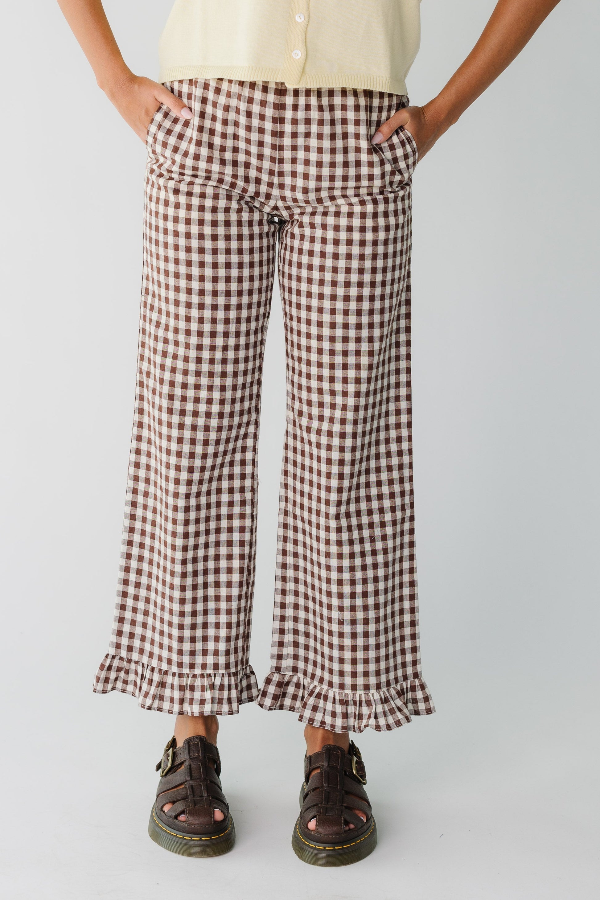 Brown gingham wide leg pant with ruffle hem and pockets