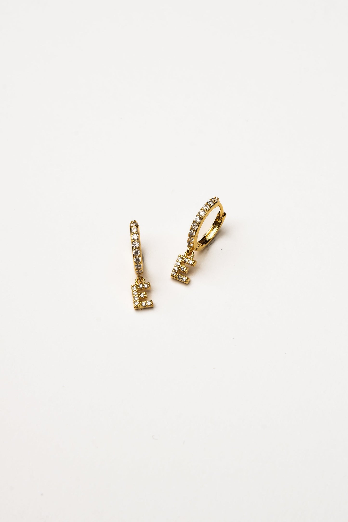 Cove Initial CZ Huggie WOMEN'S EARINGS Cove Accessories E 18k Gold Dipped 