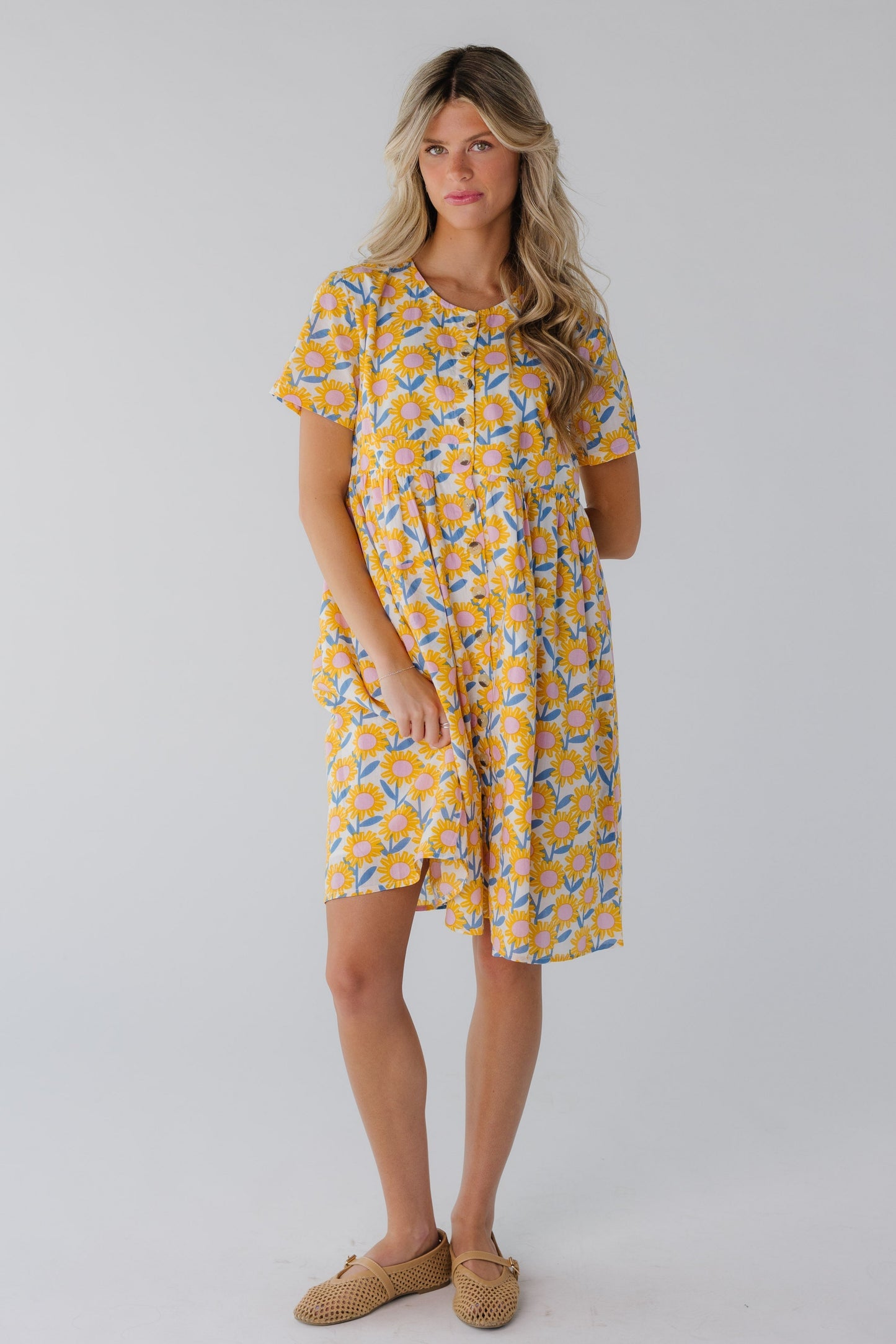 Yellow button down dress with front patch pockets