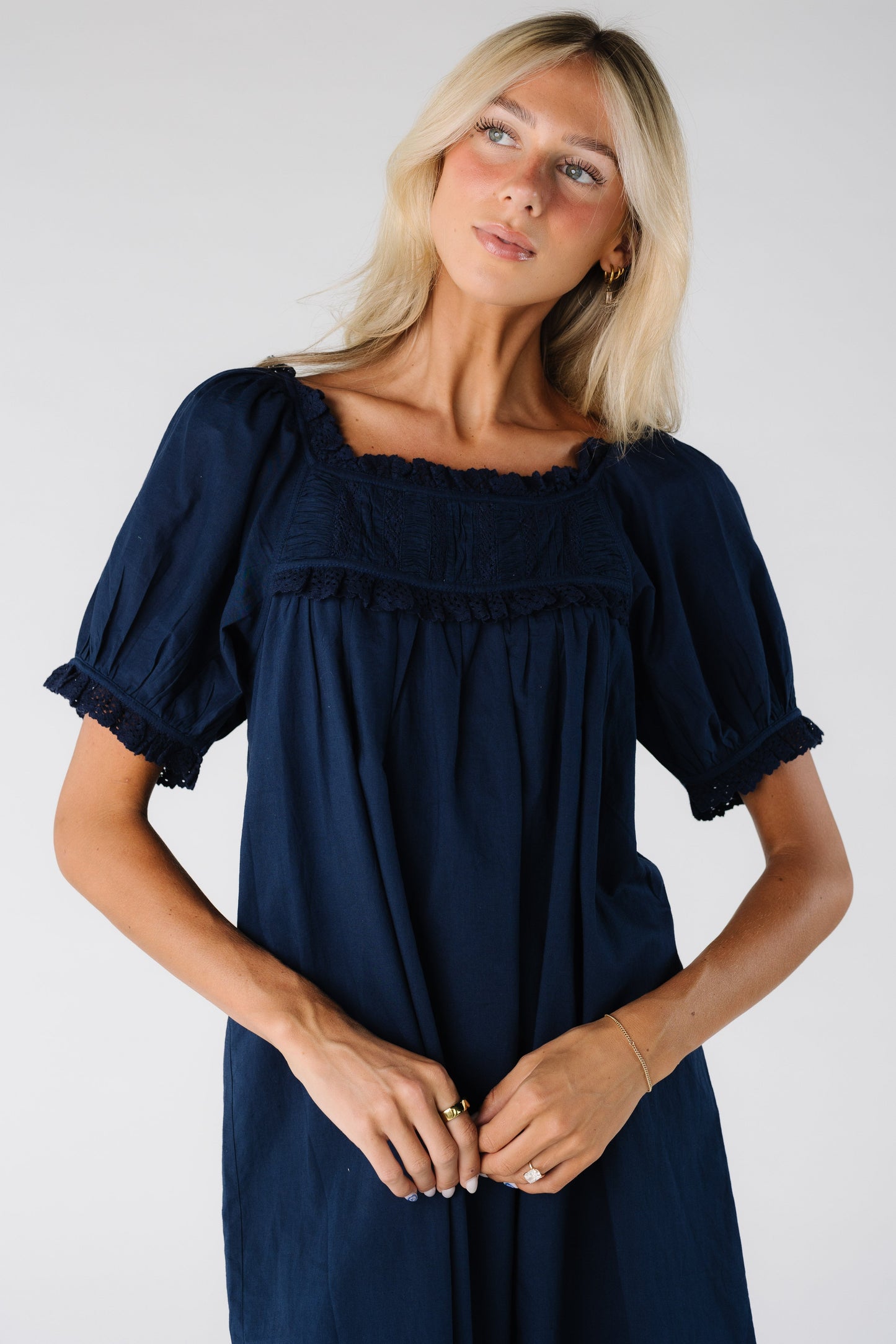 Modest women's knee length dress with square neckline and short sleeves