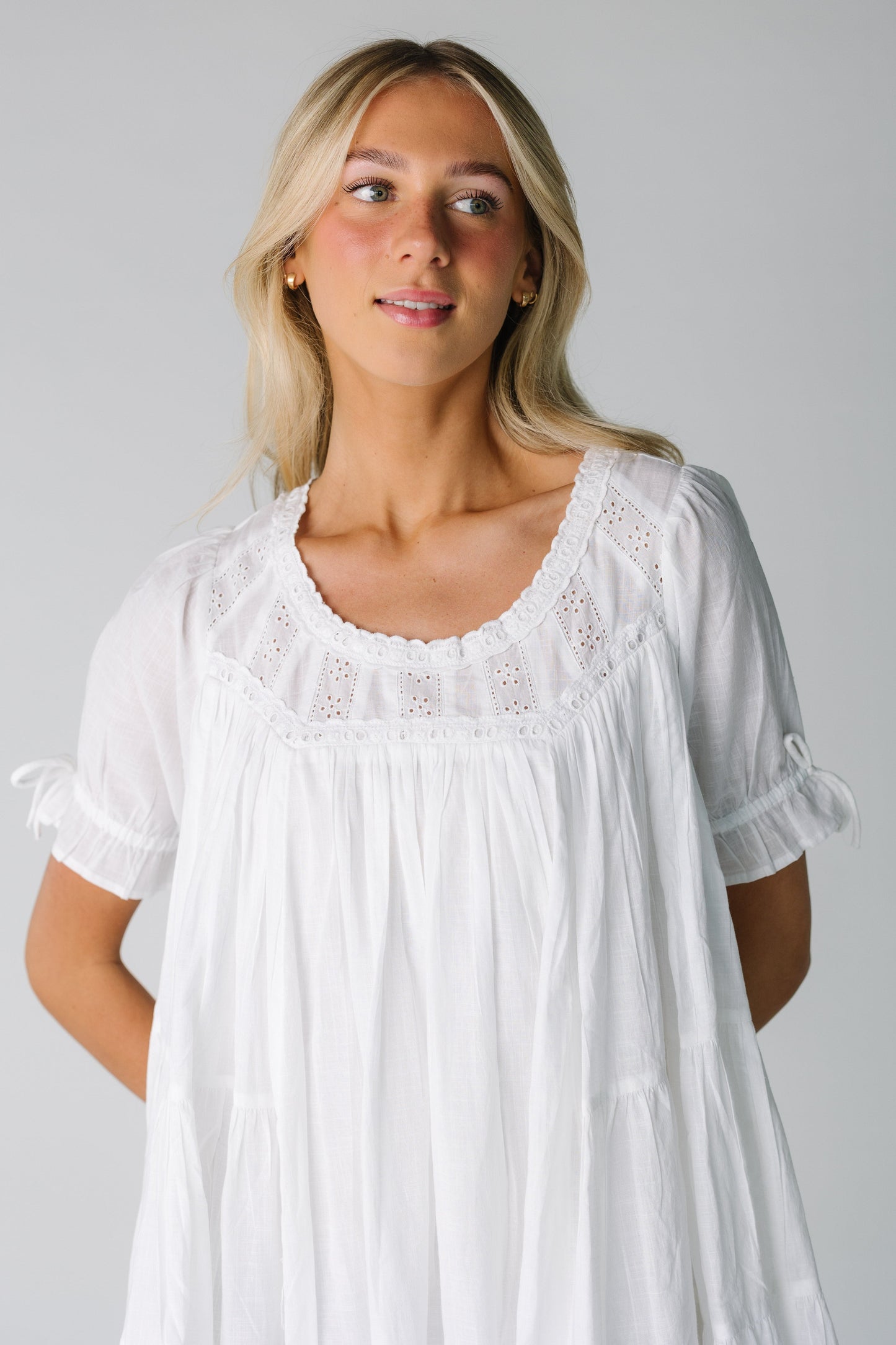 Round neck white dress with lace insets