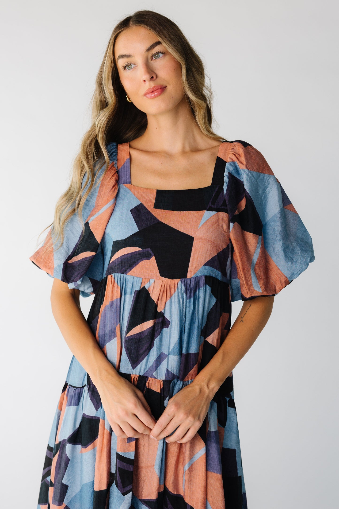 Modest women's colorful print dress with square neckline and half length sleeves