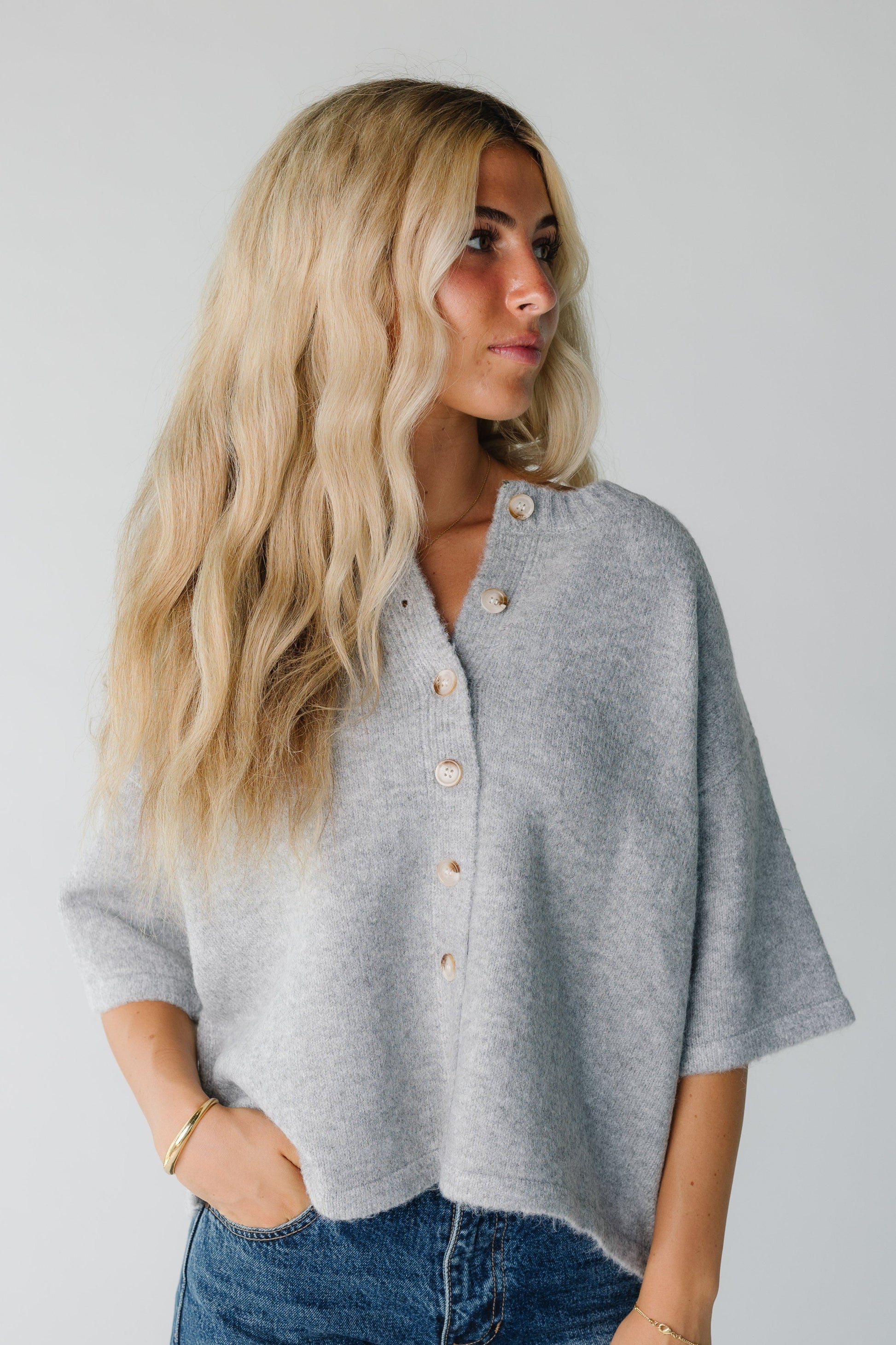 Modest women's grey cardigan with crew neckline and half length sleeves