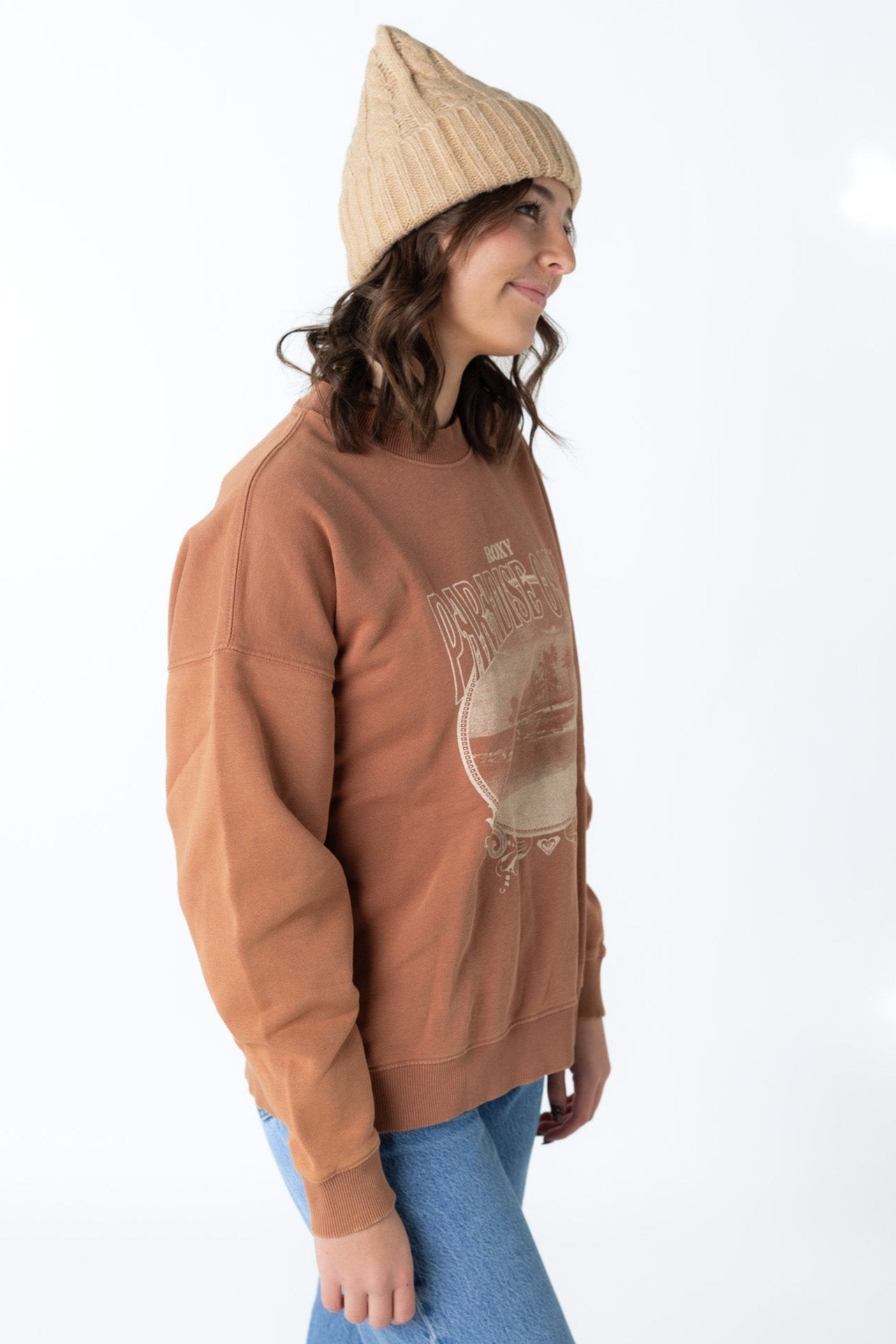 Modest Roxy Lineup Oversized Crew side view with long sleeves on a cinnamon color graphic sweatshirt