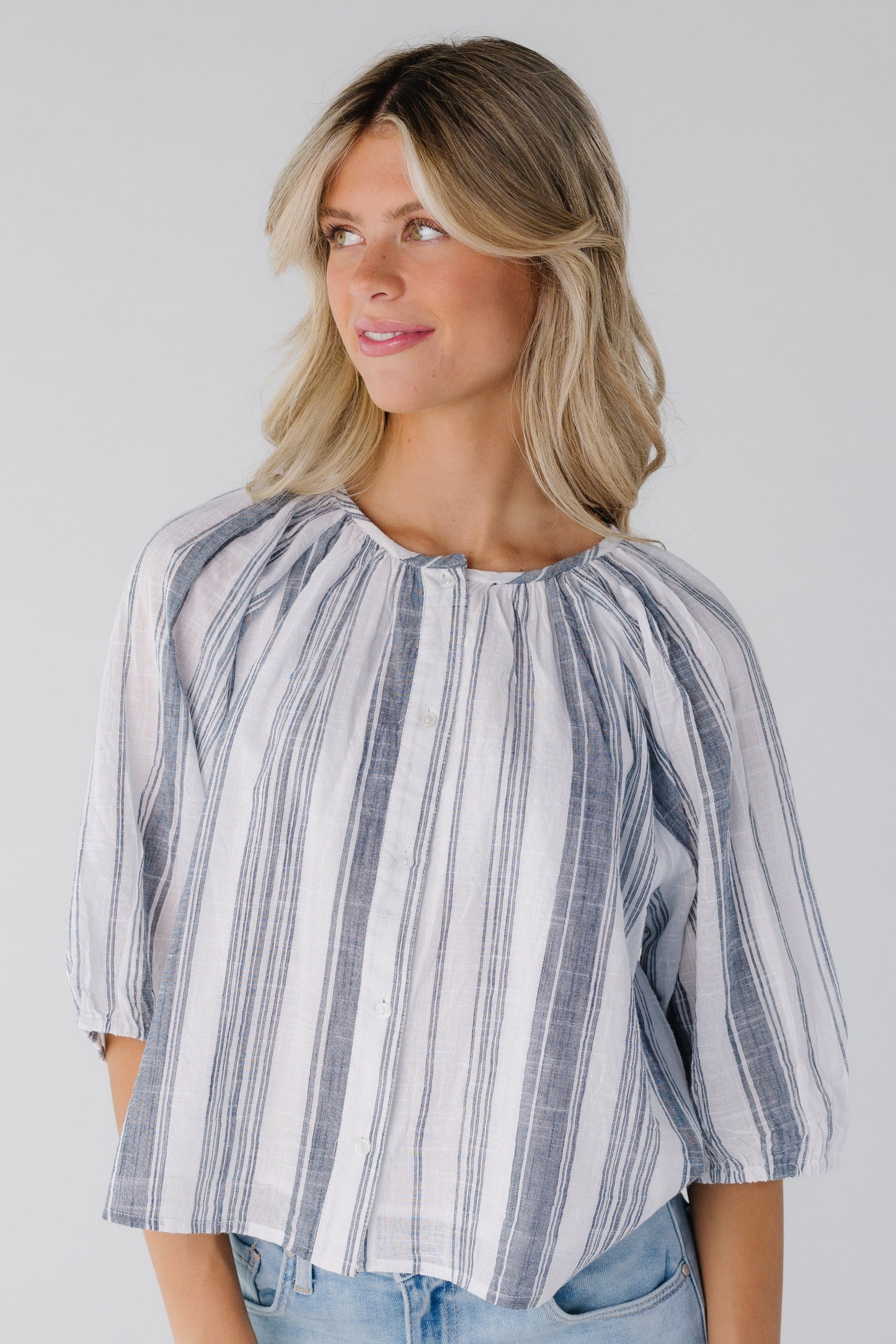 Modest blue and white stripe top with half length sleeves