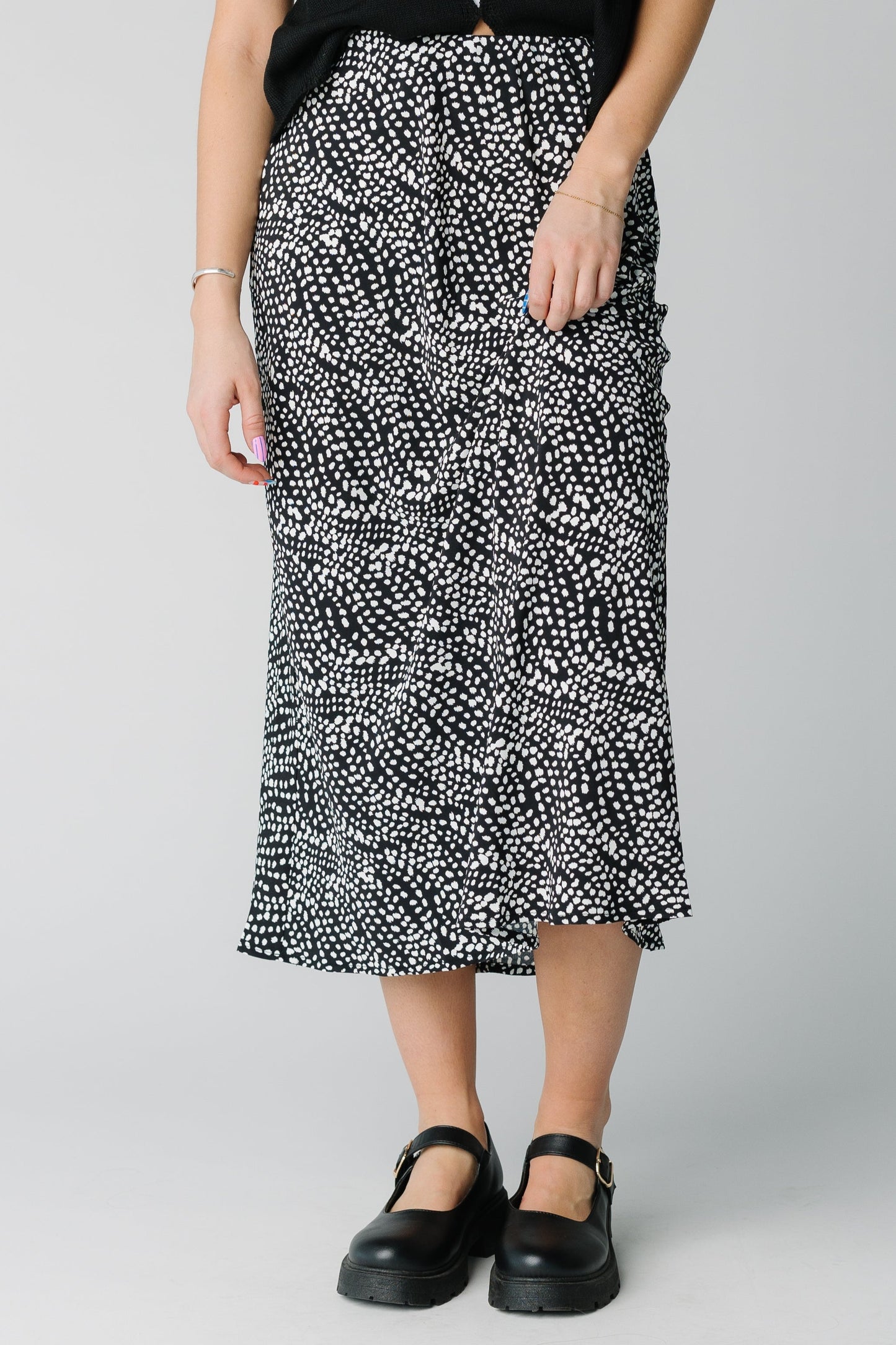 Black and white midi skirt in black with patterned white dots