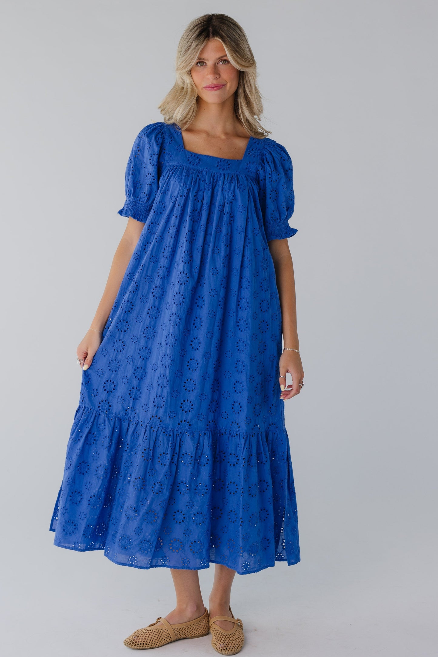 Modest all eyelet blue midi dress with square neckline and short puff sleeves