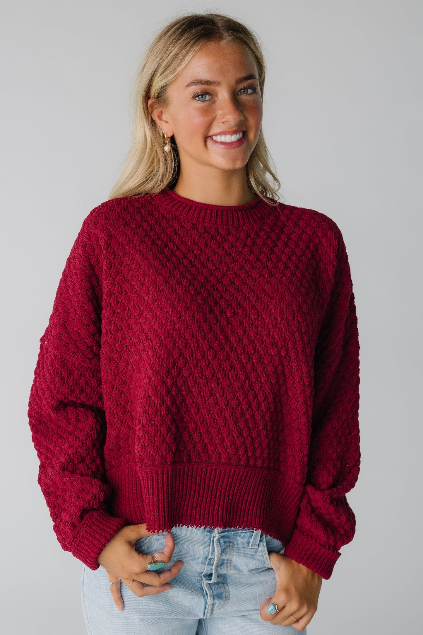 Modest woman's wine textured sweater with long sleeves