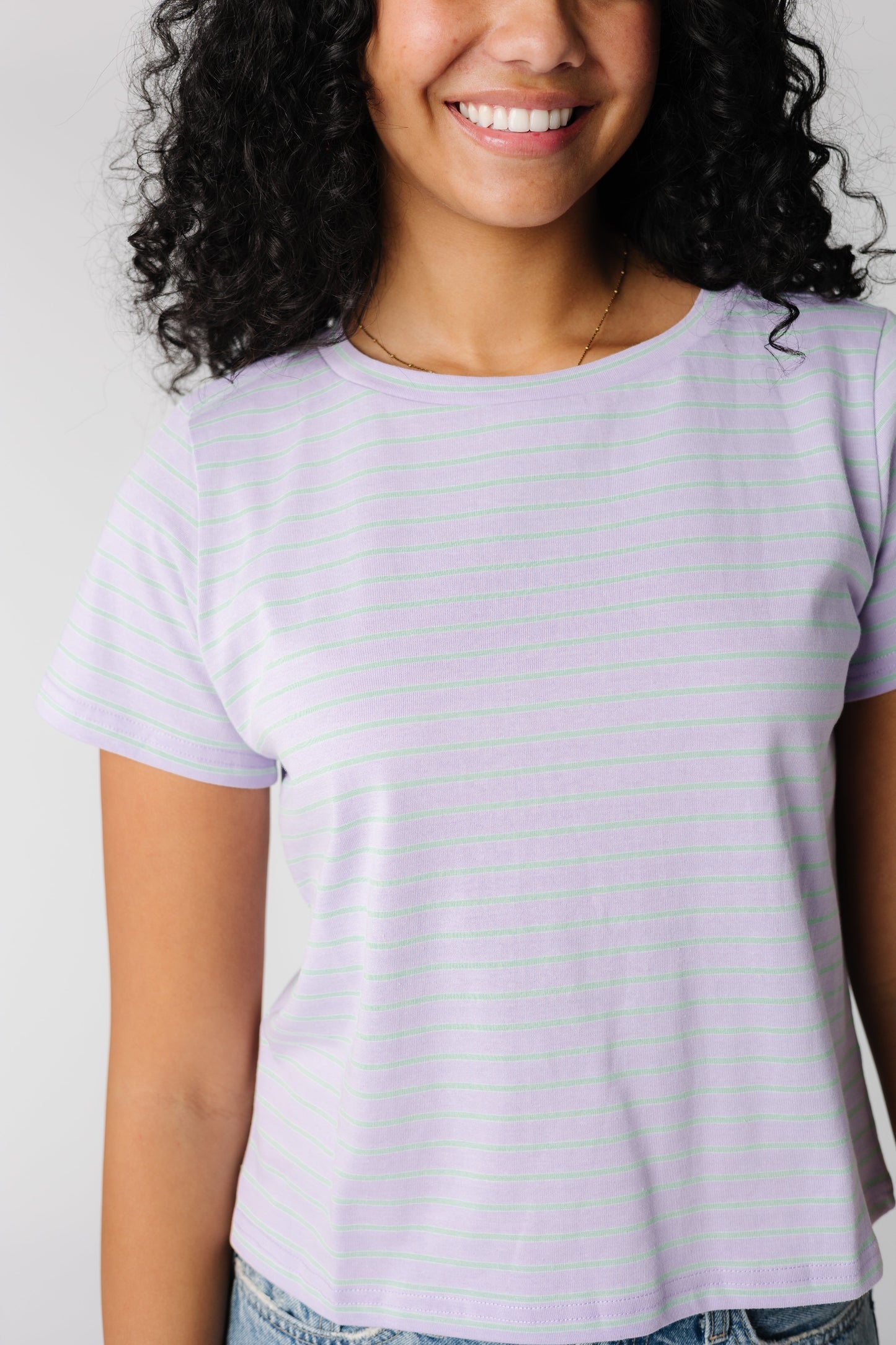 Modest purple tee with crew neckline and short sleeves