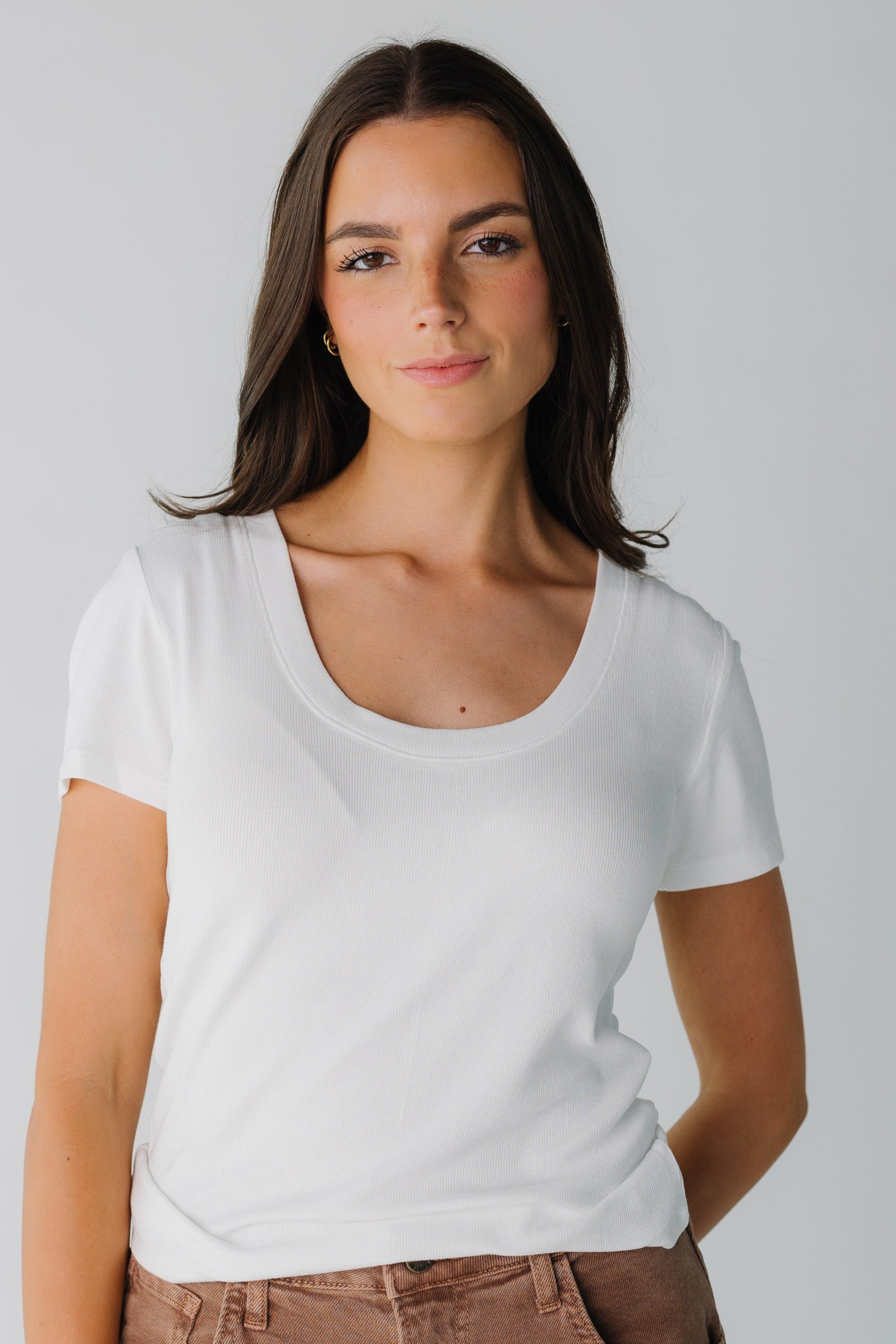 Modest white women's top with scoop neckline and short sleeves