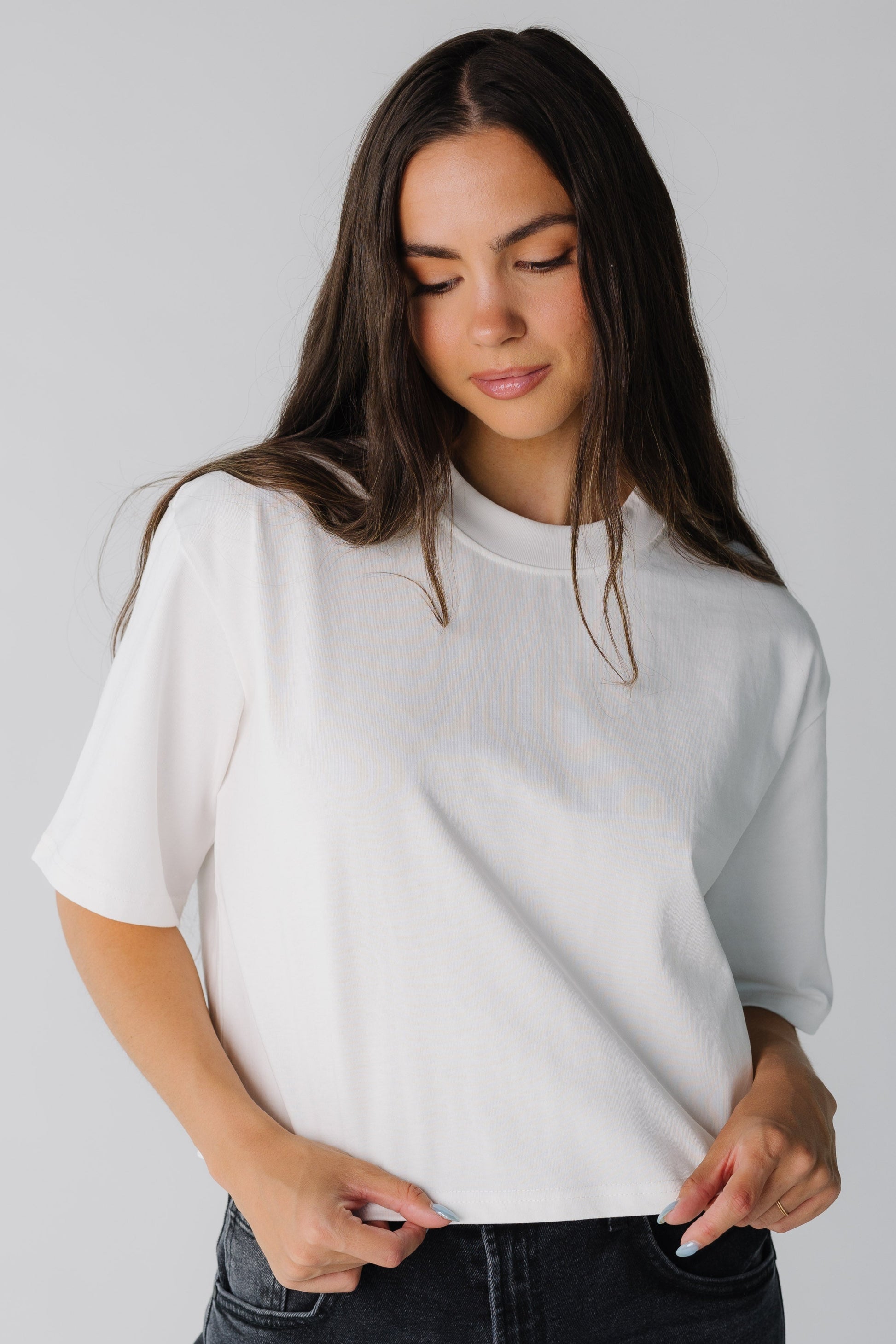 Modest women's white tee with crew neckline and elbow length sleeves