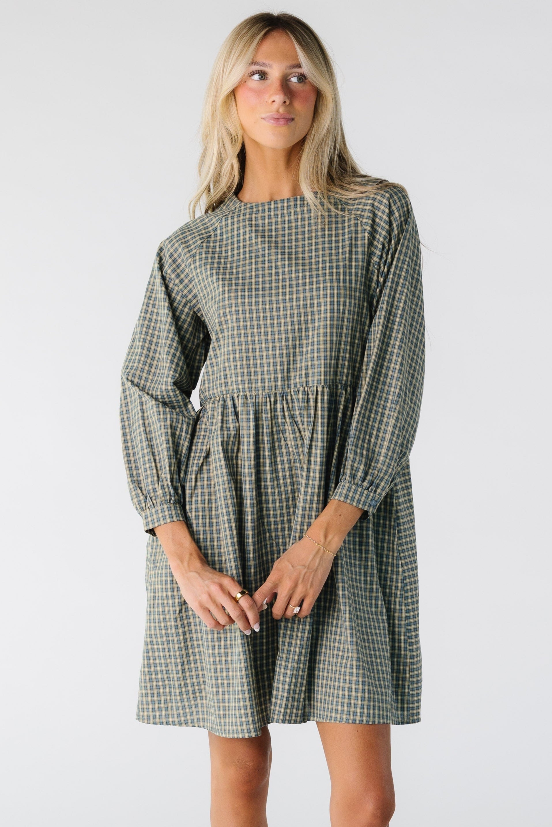 Modest women's green plaid dress with long sleeves