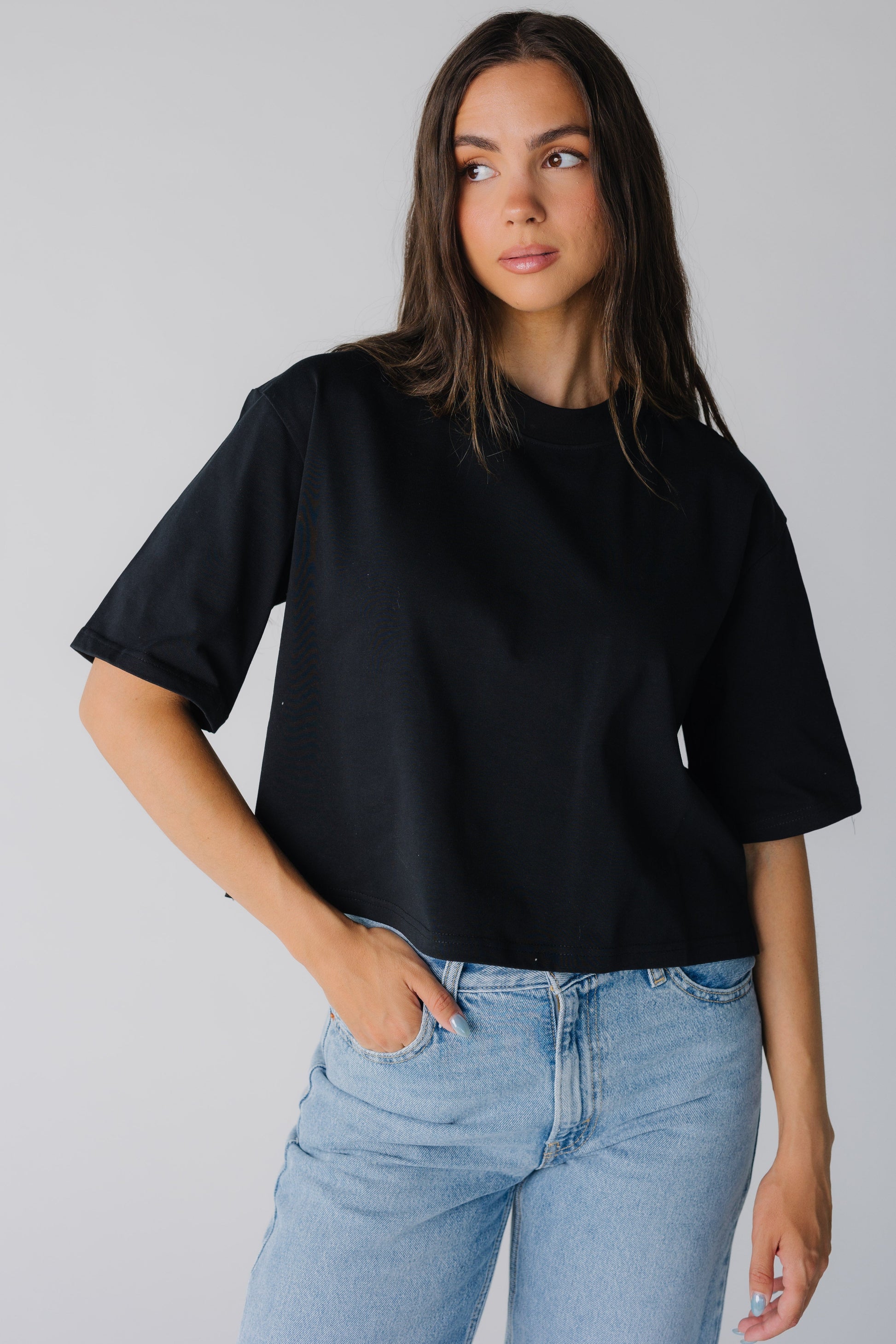 Modest women's black crew neck tee with elbow length sleeves