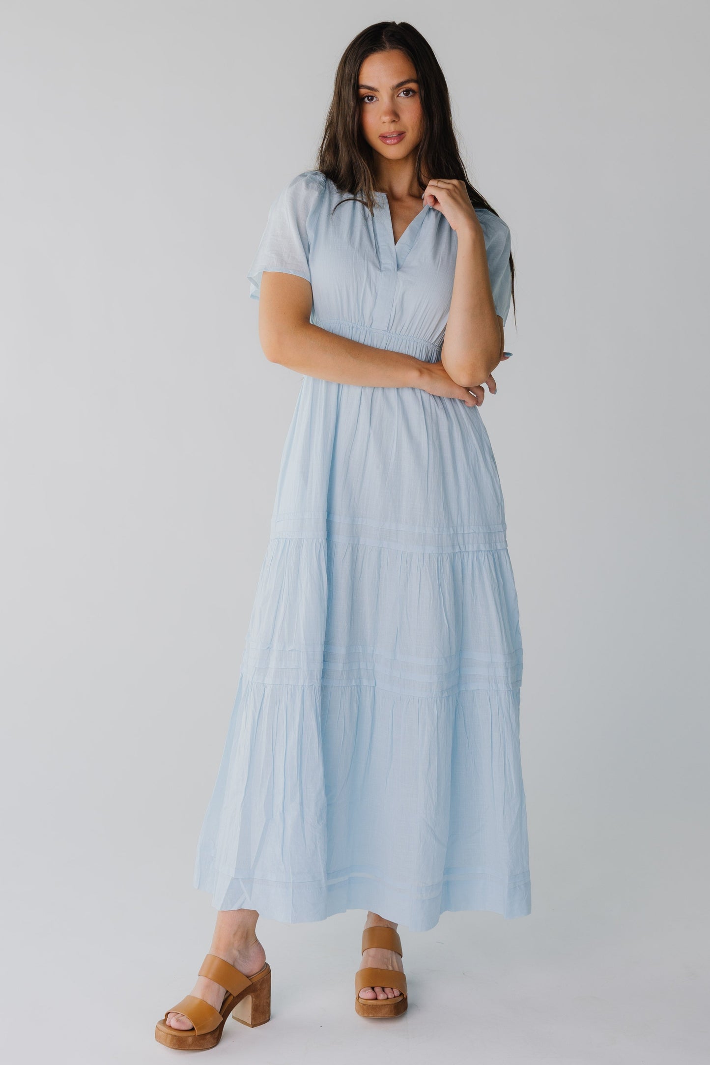 Light blue max with V-neckline and flutter sleeves