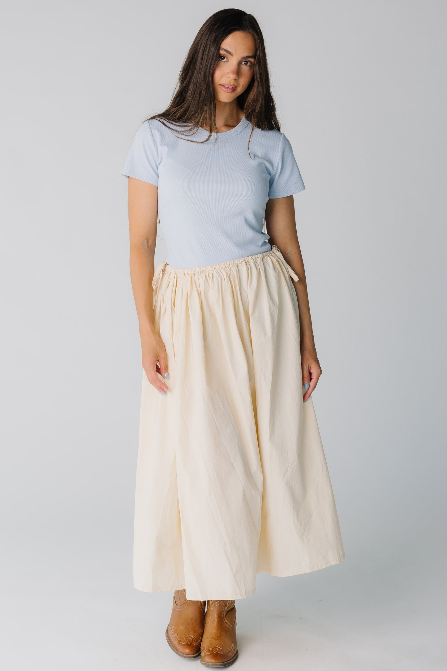 Modest cream midi skirt with elastic and bow waistband