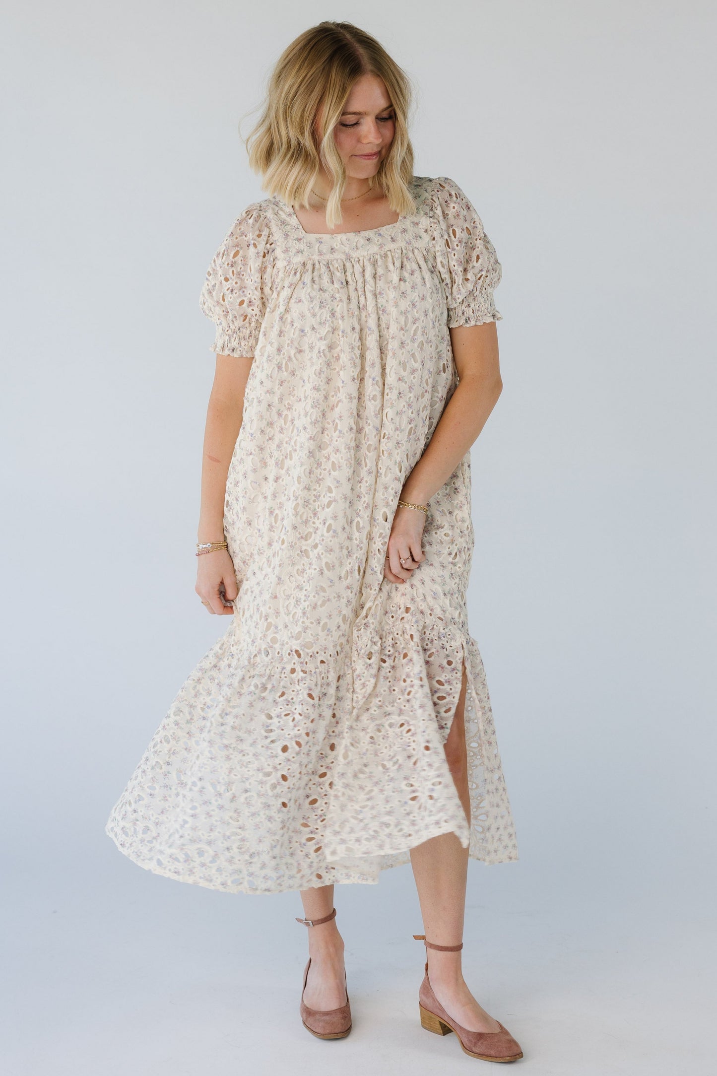 Flowing floral print eyelet midi with a wide bottom ruffle