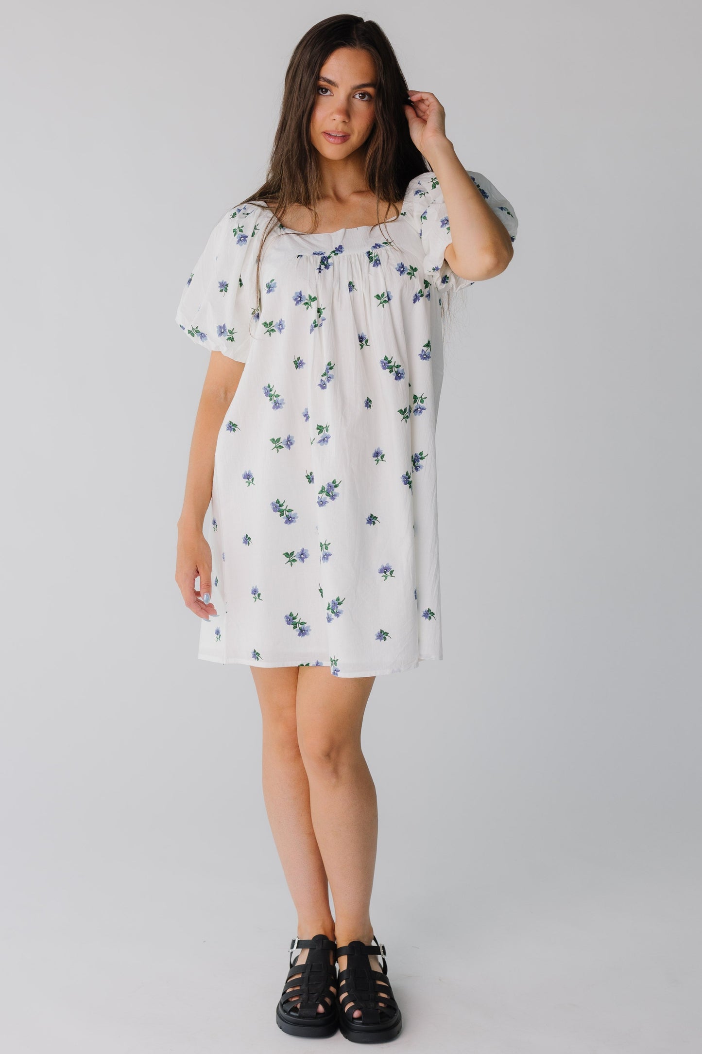 Knee length floral print dress with square neckline and balloon sleeves